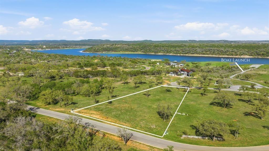 A spacious green lot offers sweeping water views 