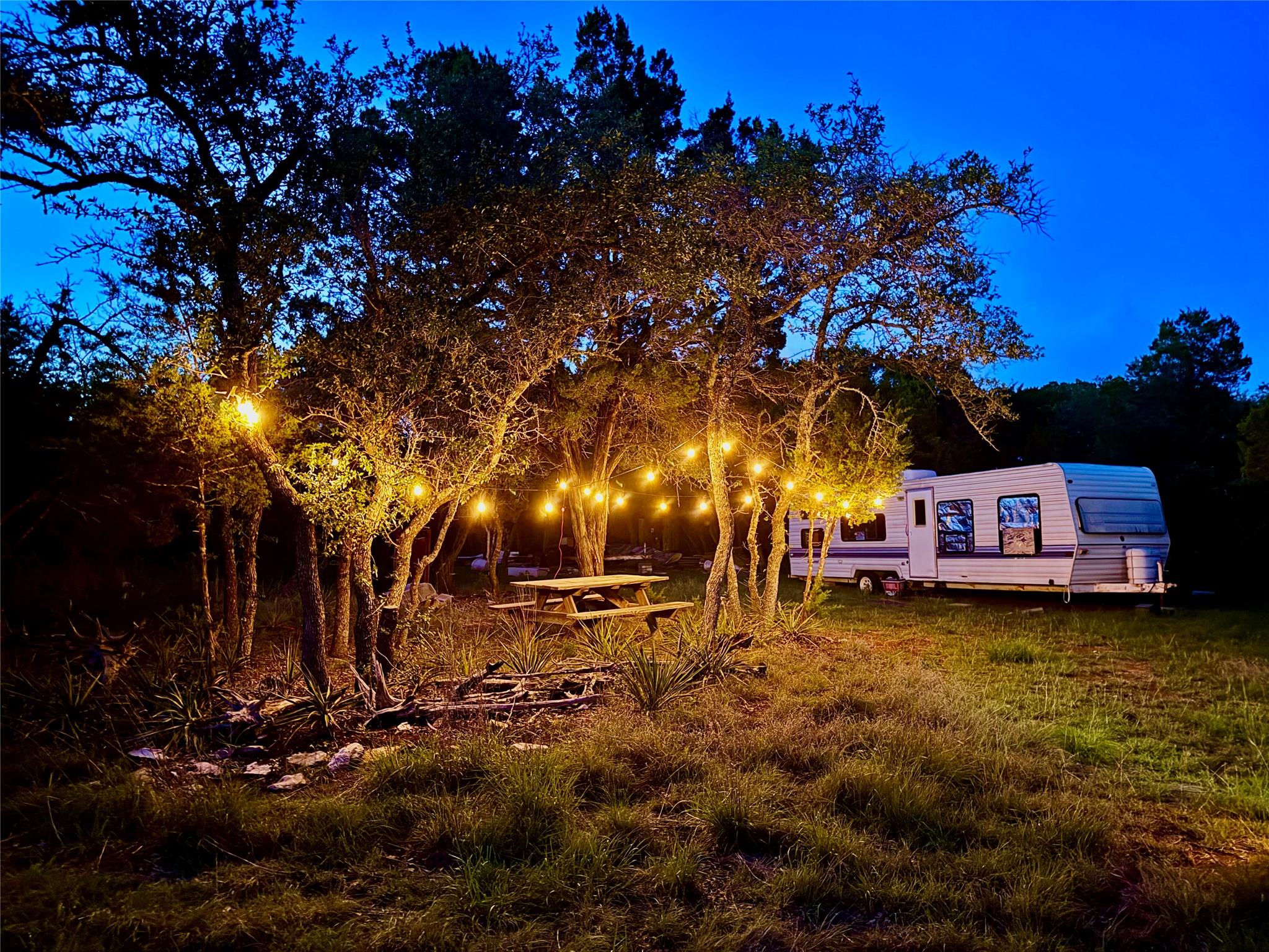 A tranquil outdoor setting offers a picnic area a