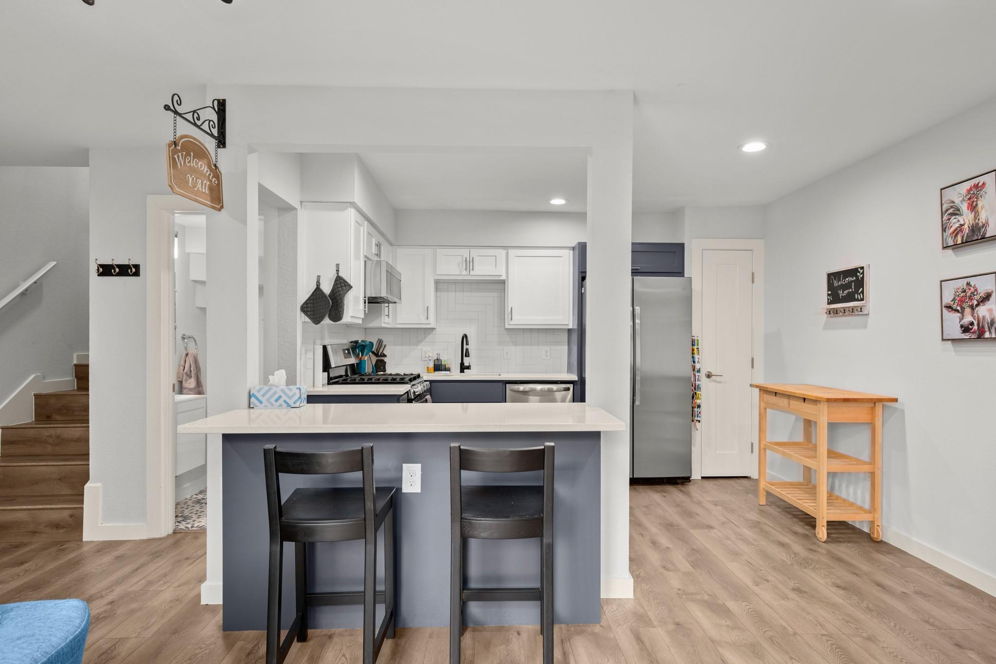 Kitchen featuring appliances with stainless steel