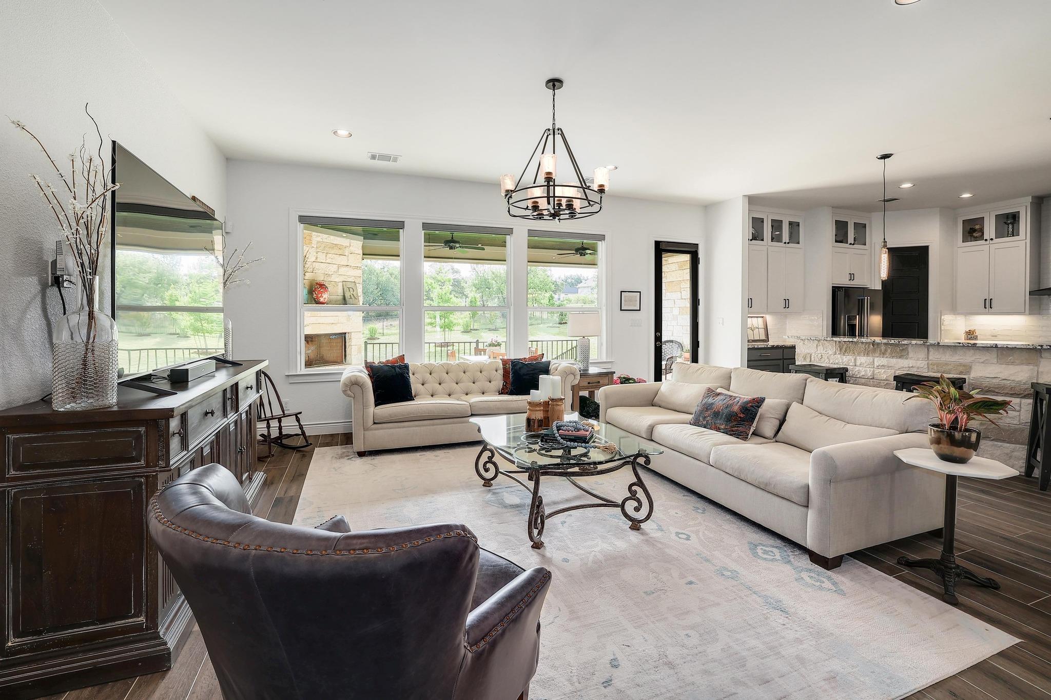Living area with dark wood finished floors and a 