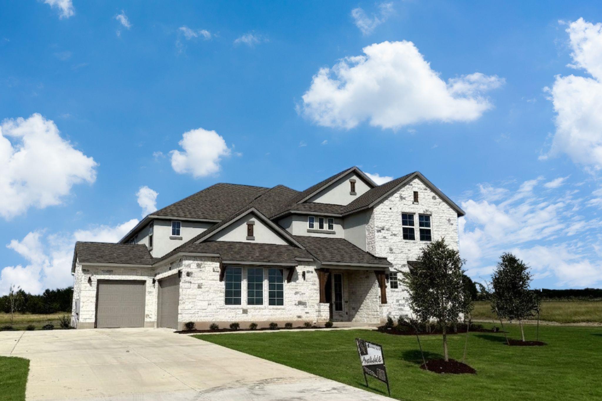 A charming stone and stucco residence awaits with