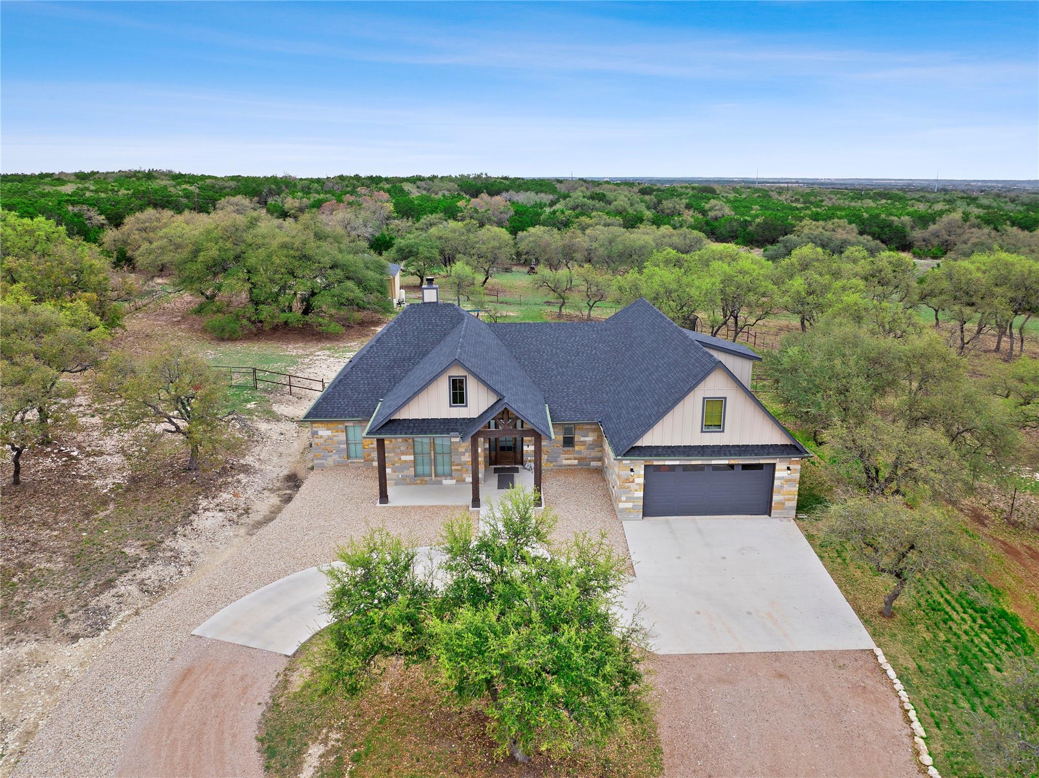 View of front of house featuring stone siding, co