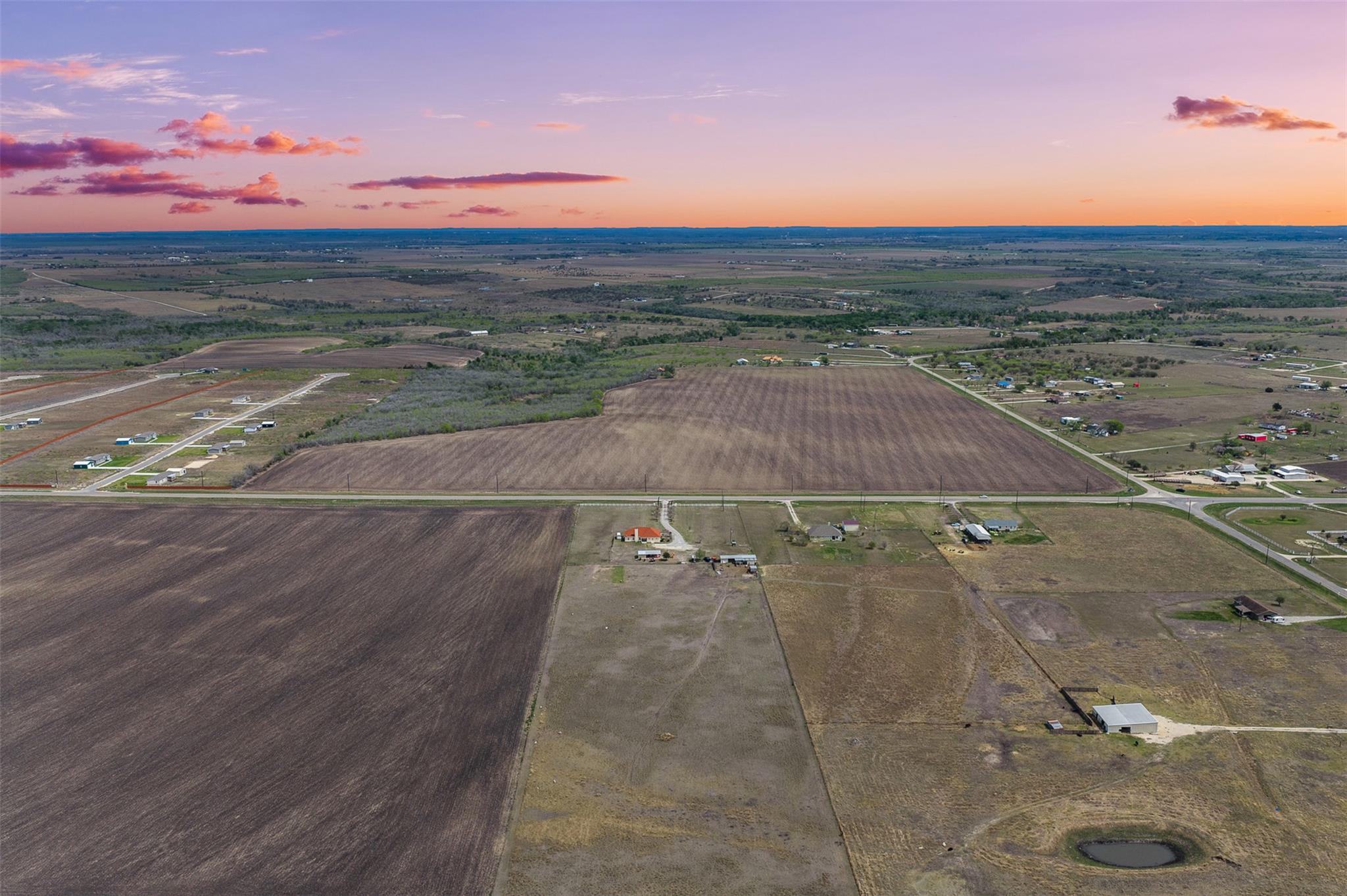 Aerial view at dusk of a view of countryside and 