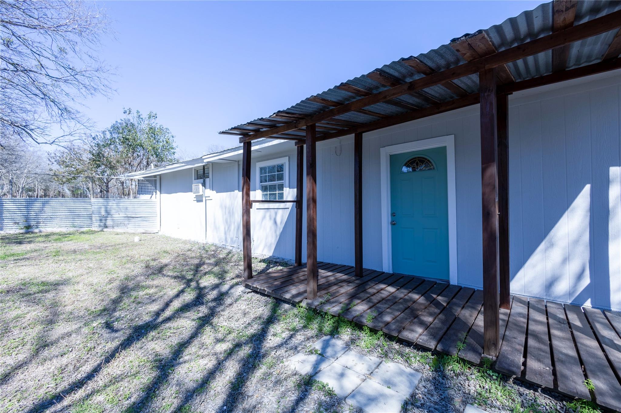 Entrance to property with a deck