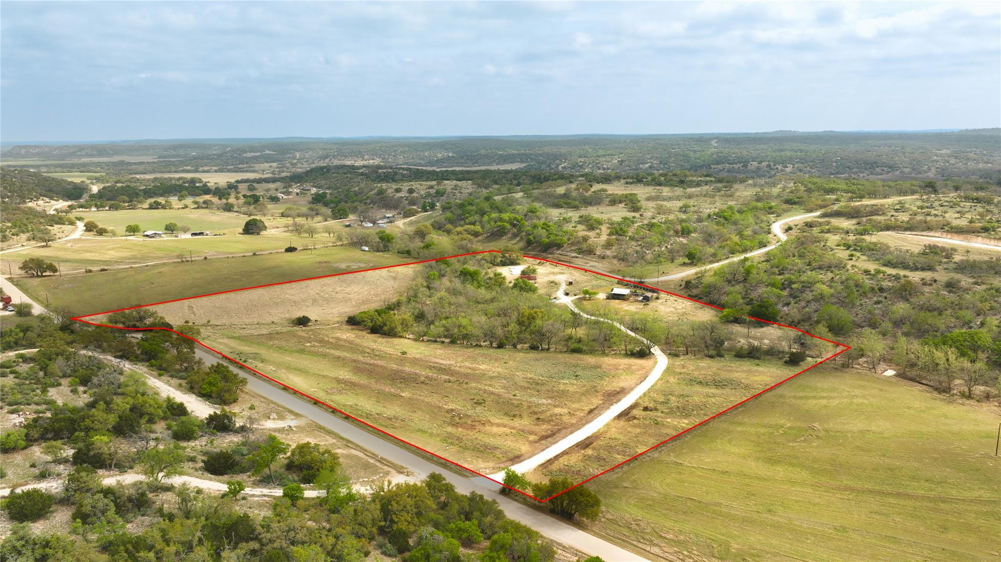 Aerial view of sparsely populated area with prope