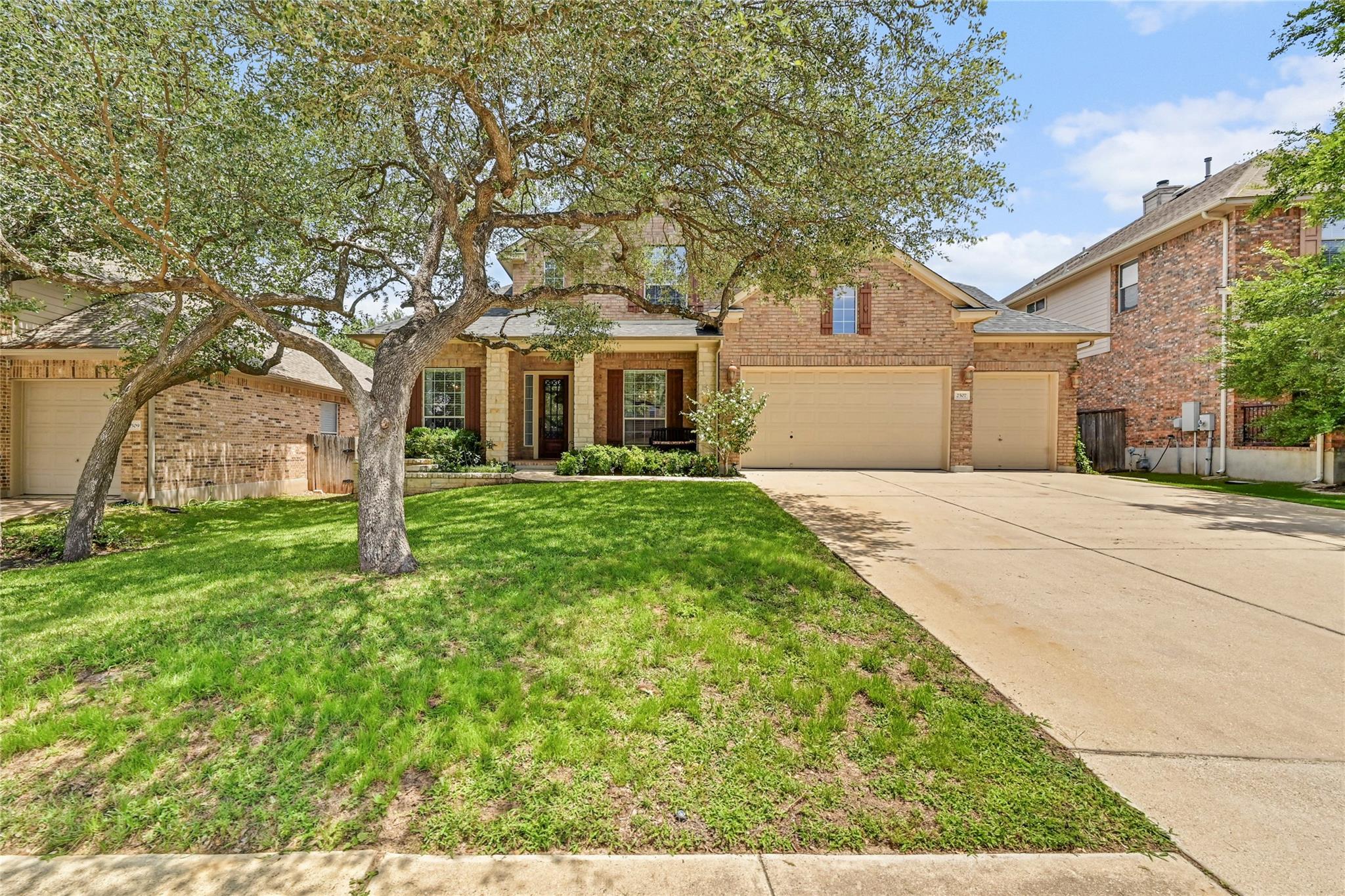 A well-maintained brick residence offers a large 