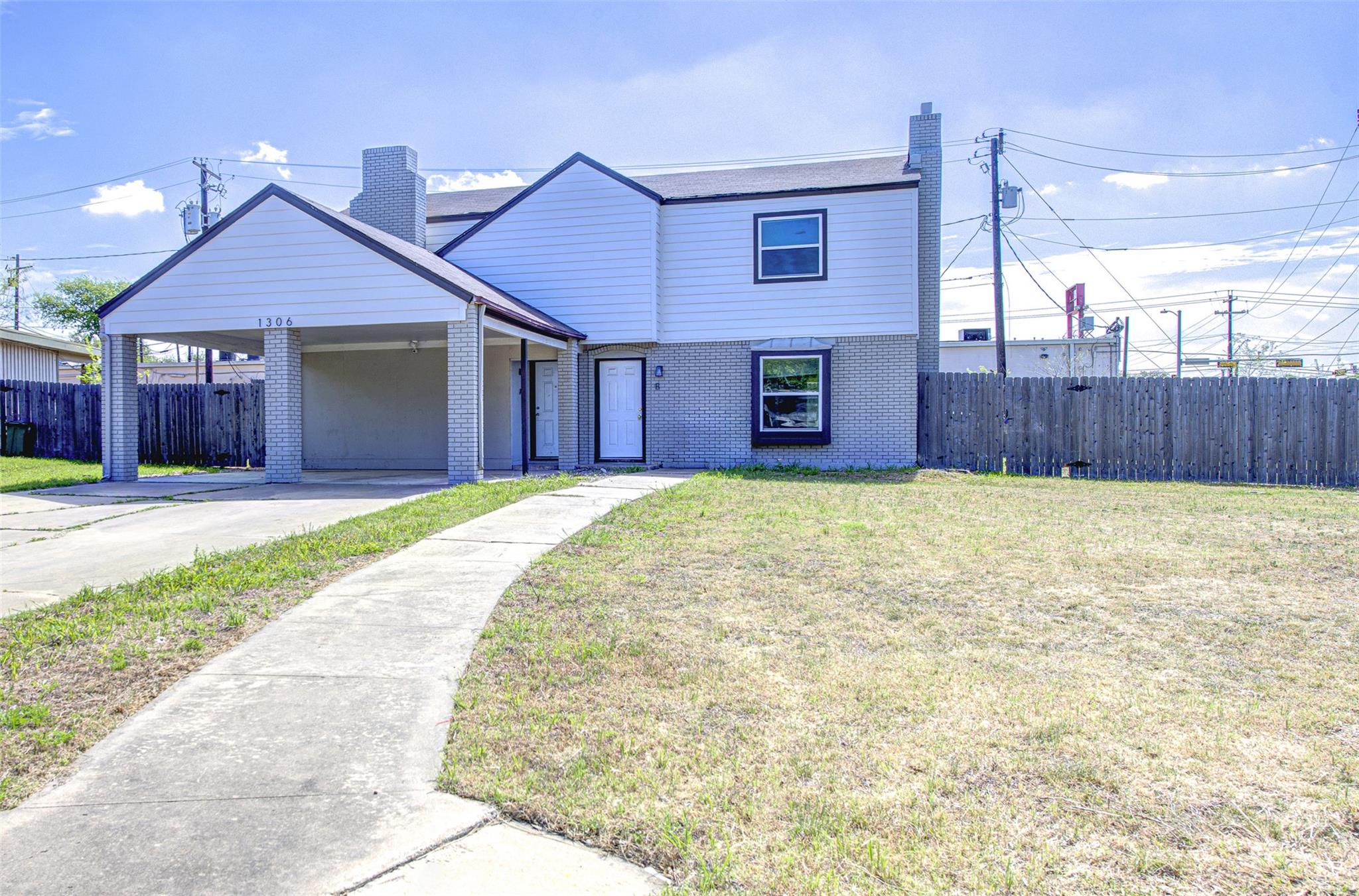 Traditional-style home with an attached carport, 