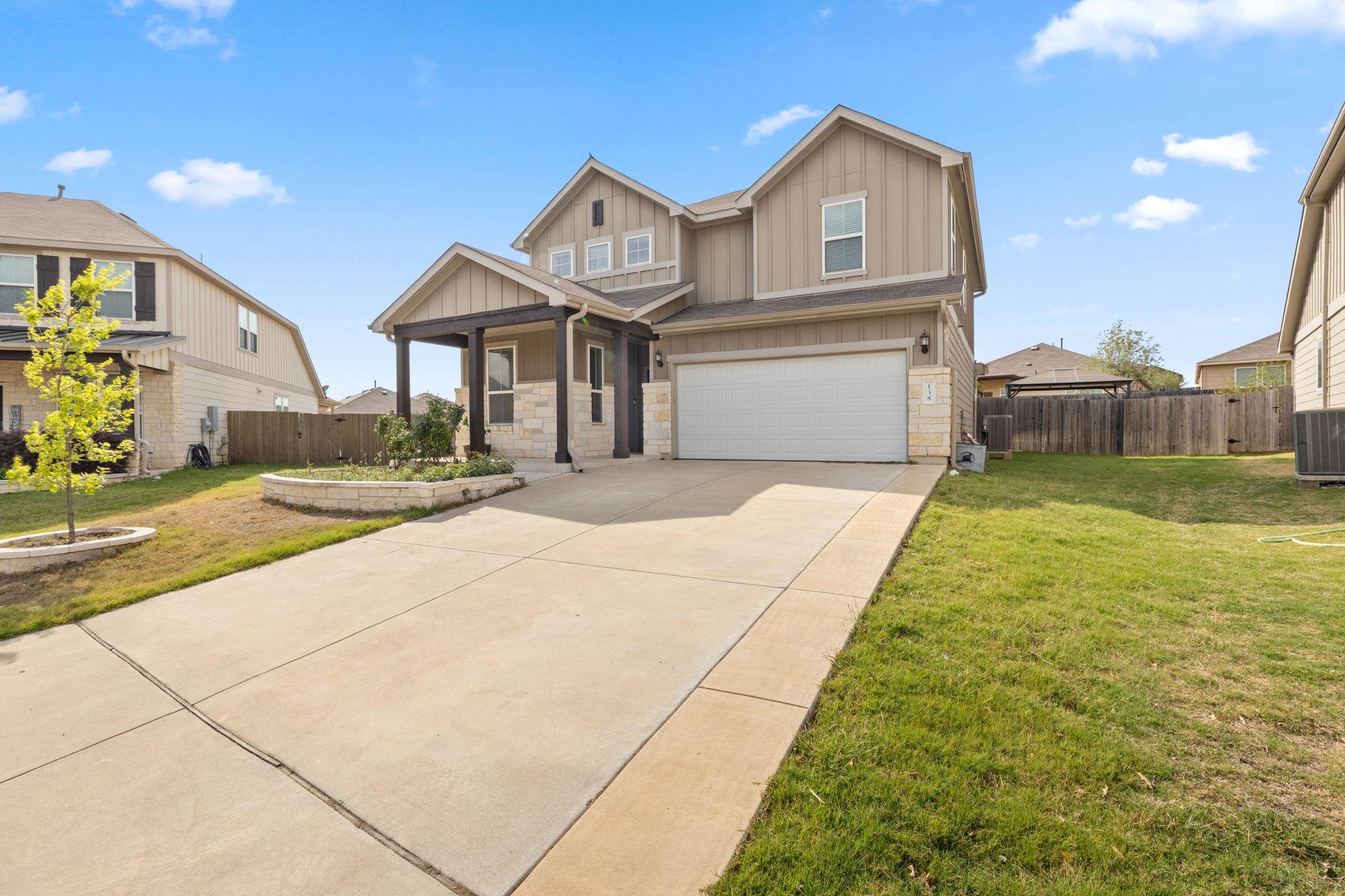 Craftsman-style home featuring board and batten s