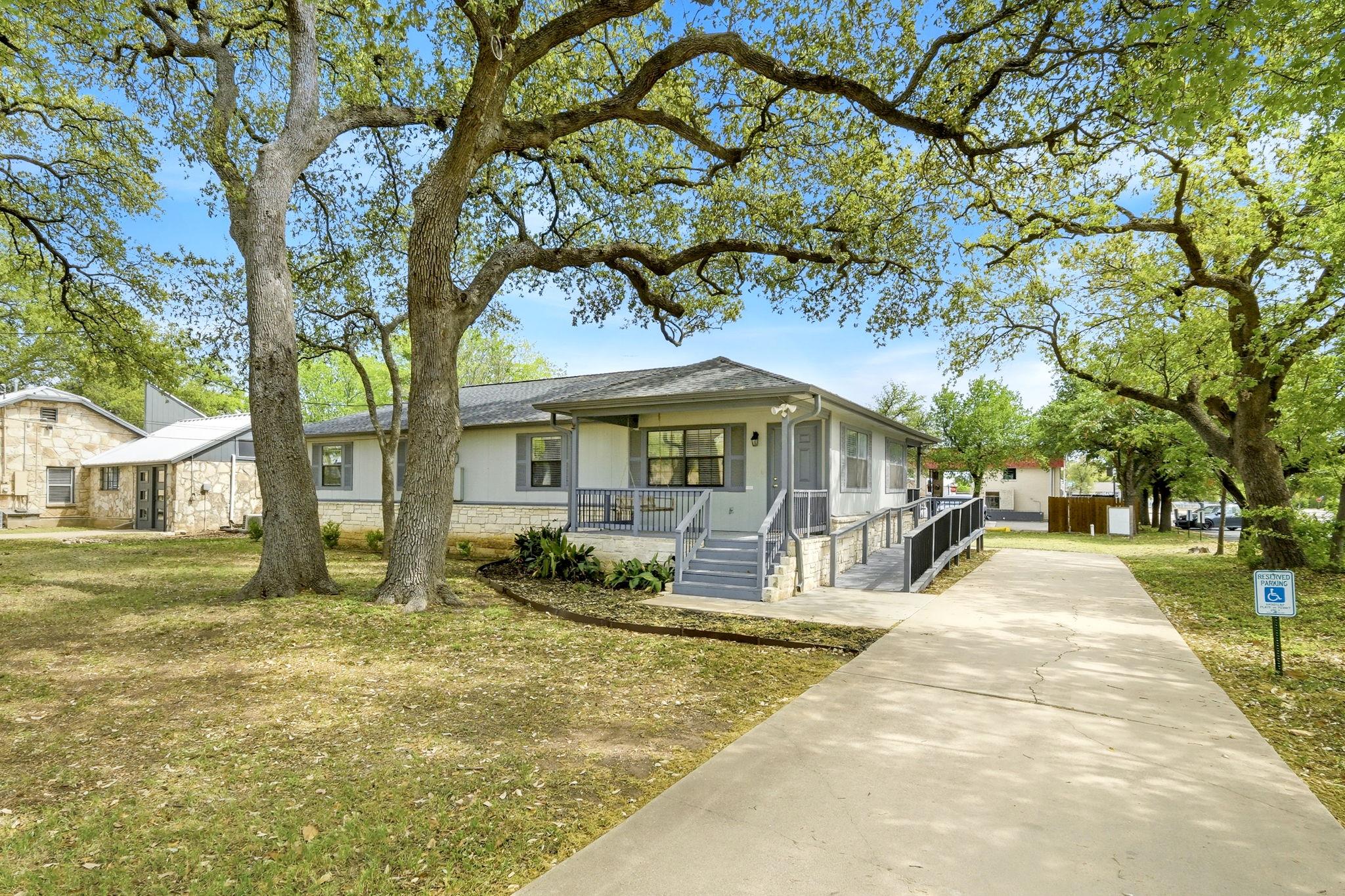 View of front of property featuring a porch, a fr