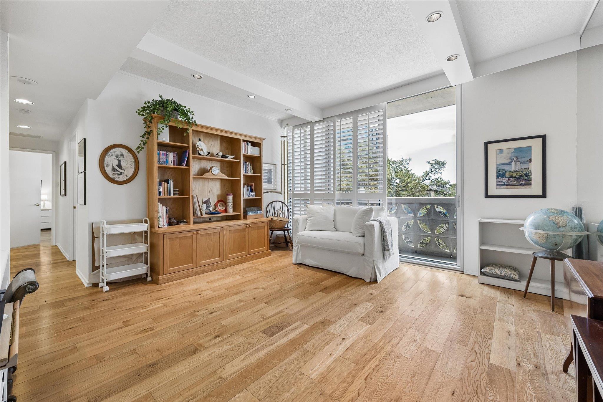 Living area featuring light wood-type flooring an