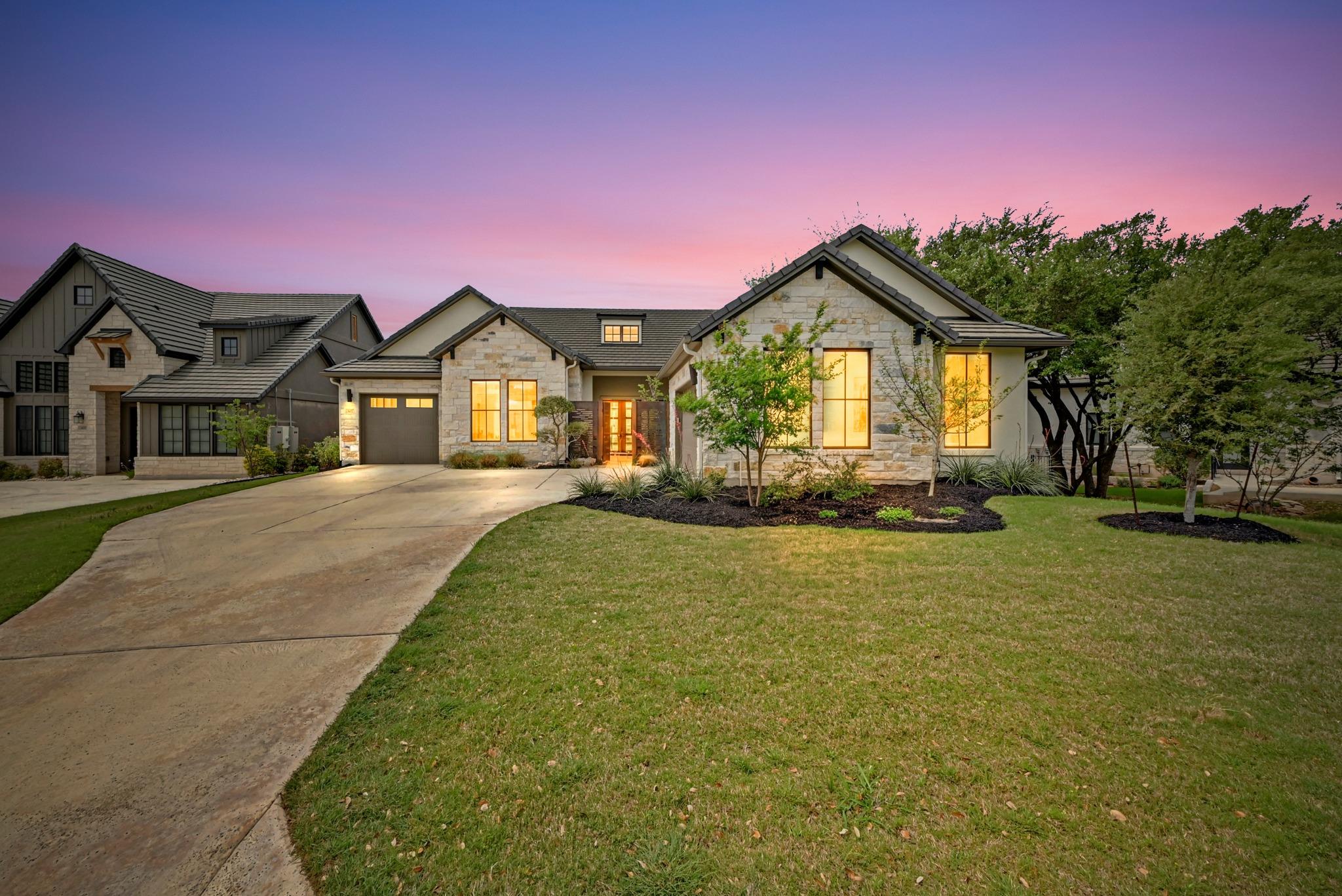 A graceful stone facade welcomes you to this meti