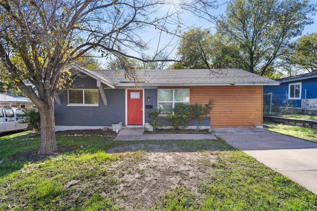 View of front of property with a front lawn