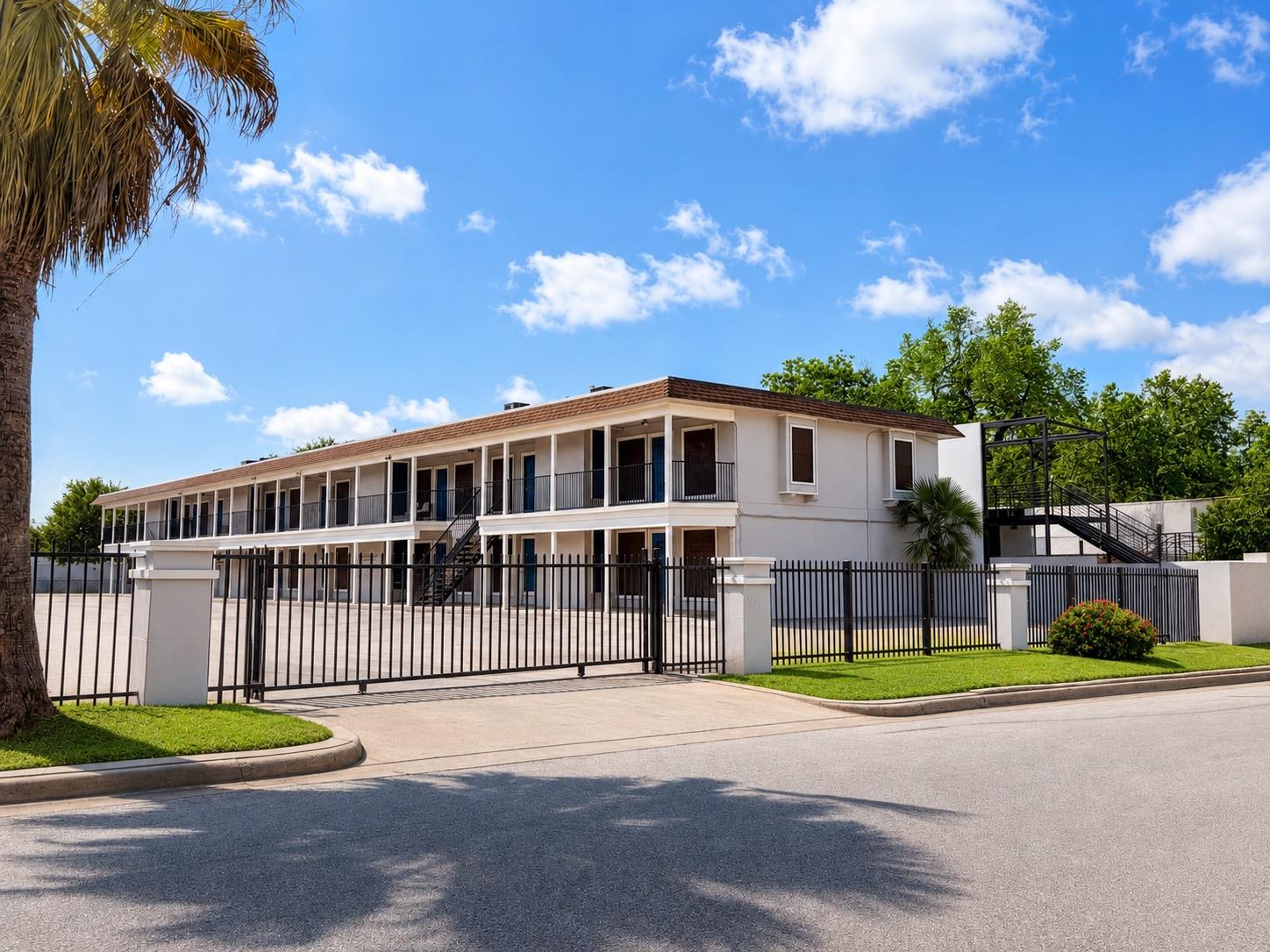 Multi-level building exterior featuring a neutral