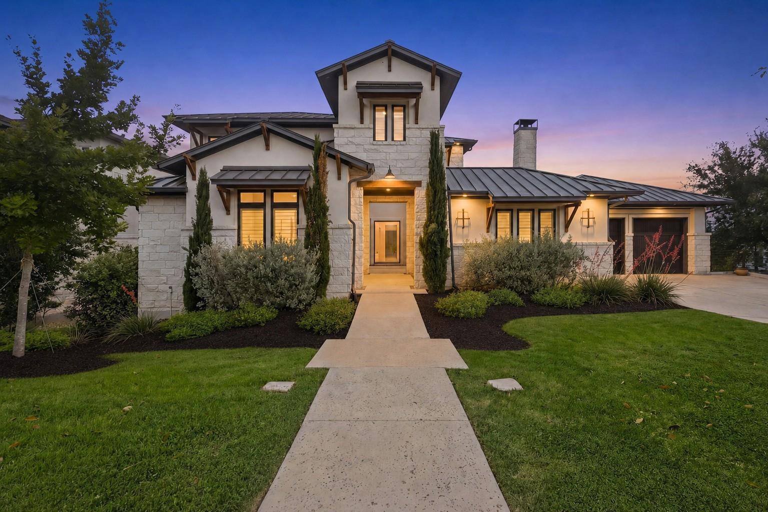 An inviting stone-clad residence with clean lands