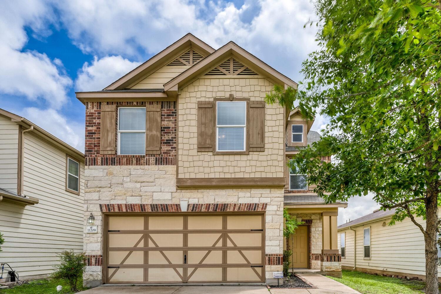 The property features a two-story exterior with a