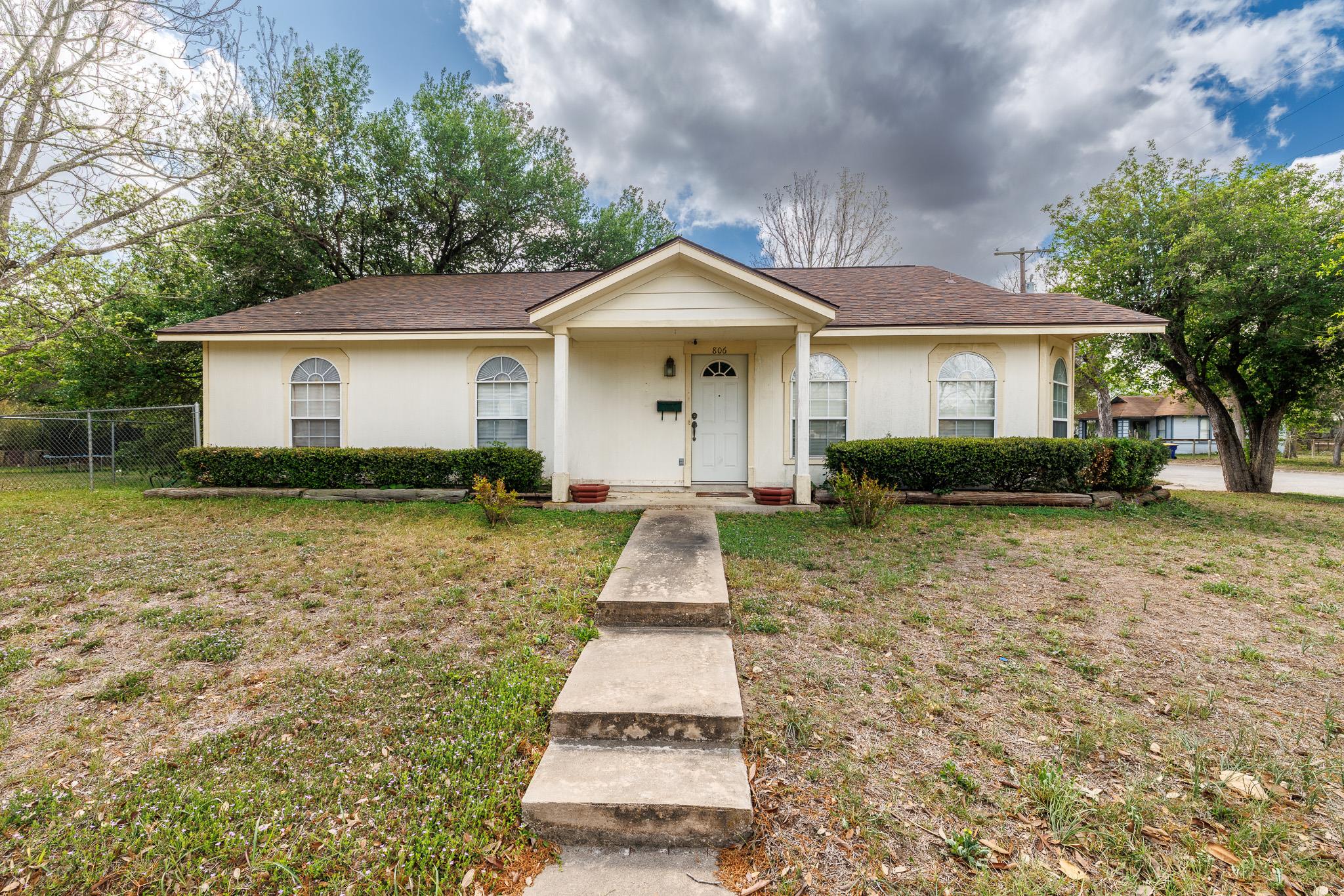 View of front of home with a porch and a shingled