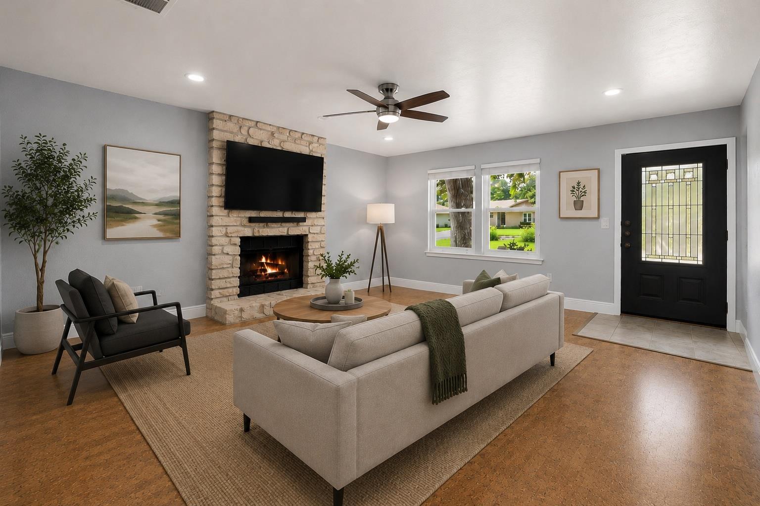 A welcoming living room featuring a cozy fireplac