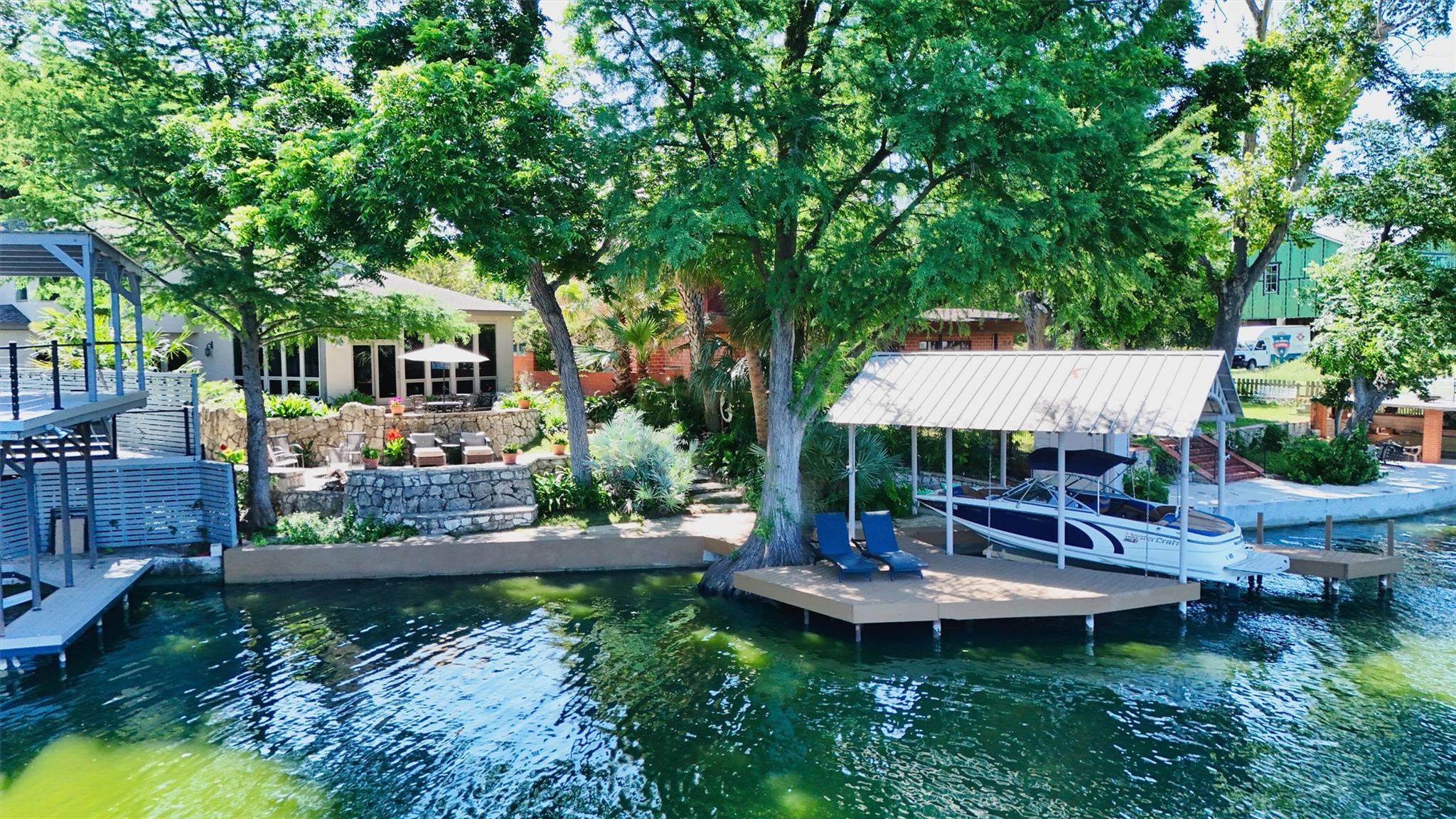 Waterfront property with multiple boat docks, a c