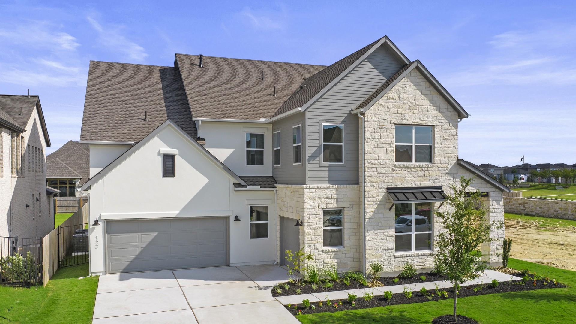 A striking contemporary facade blending stone, si
