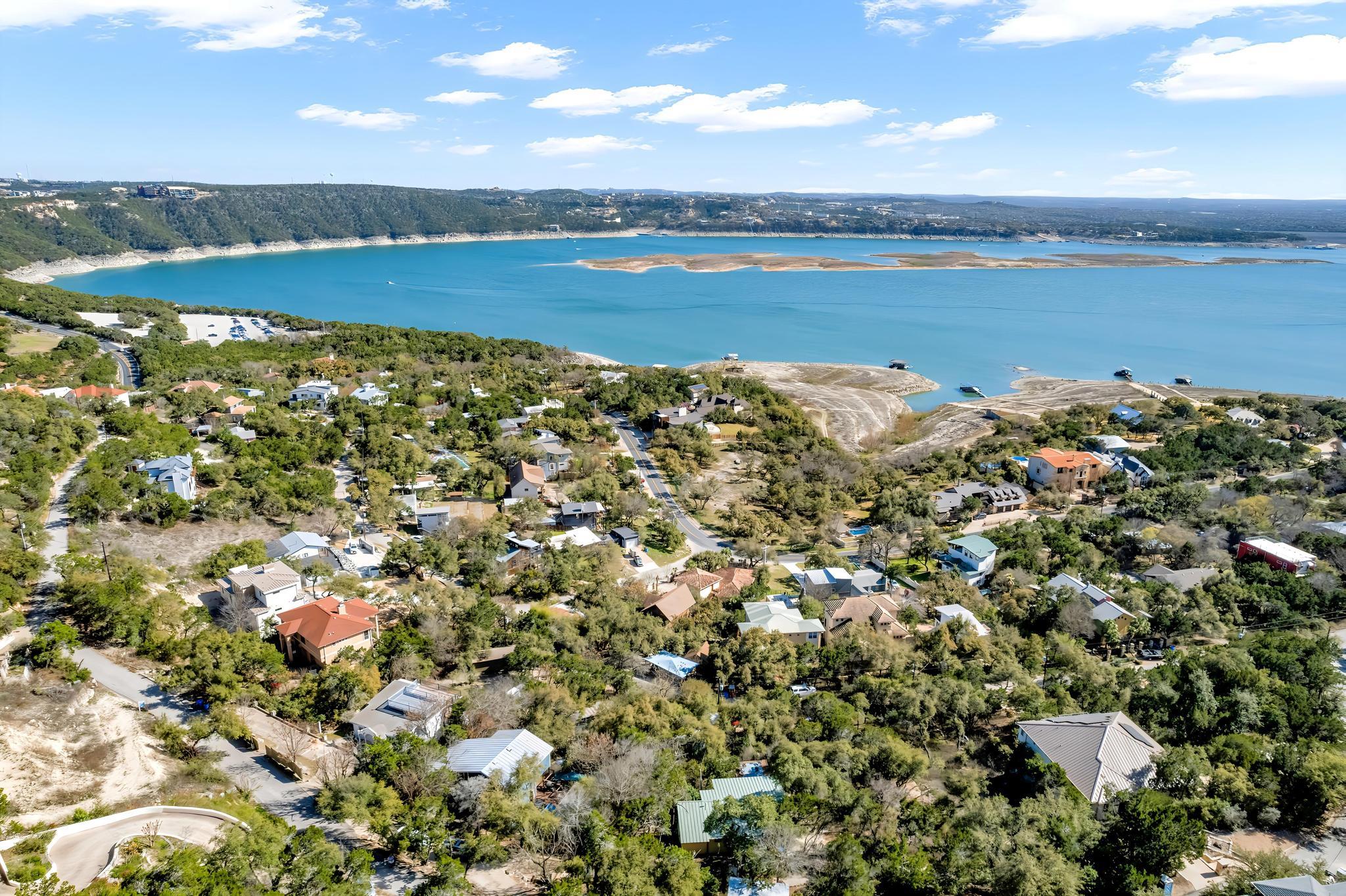 Aerial view of residential area with a nearby bod