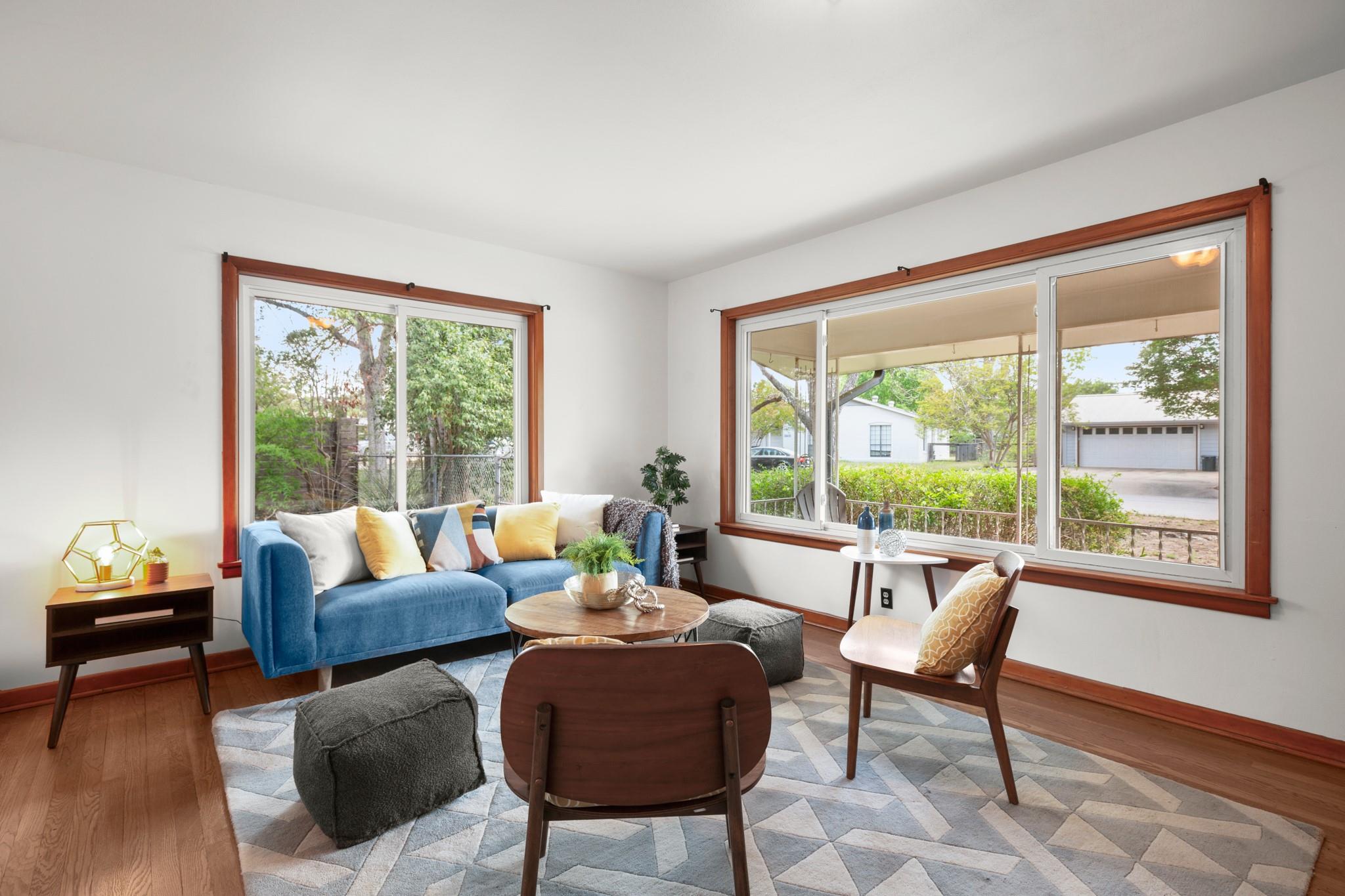 Sitting room featuring wood finished floors and b