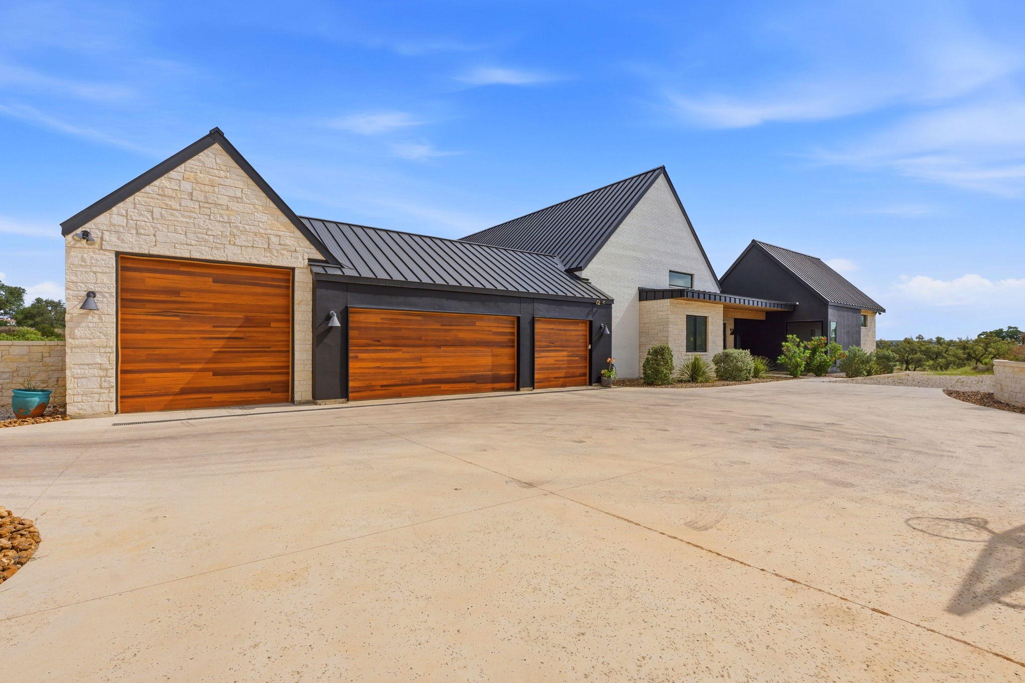 Modern exterior featuring light-colored stone and
