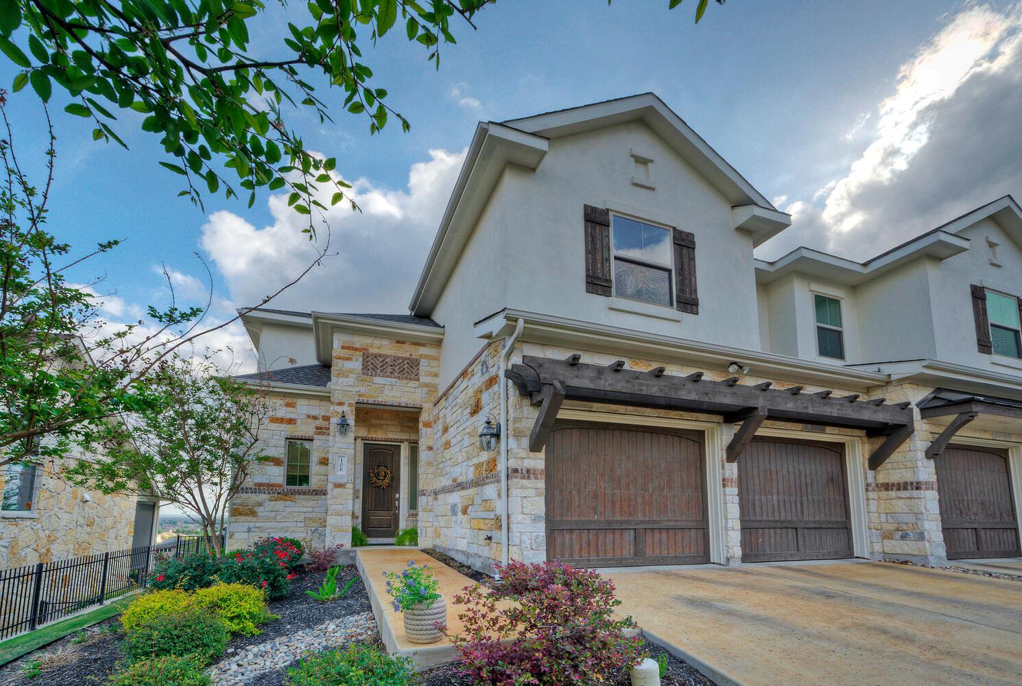 View of front of property featuring an attached g