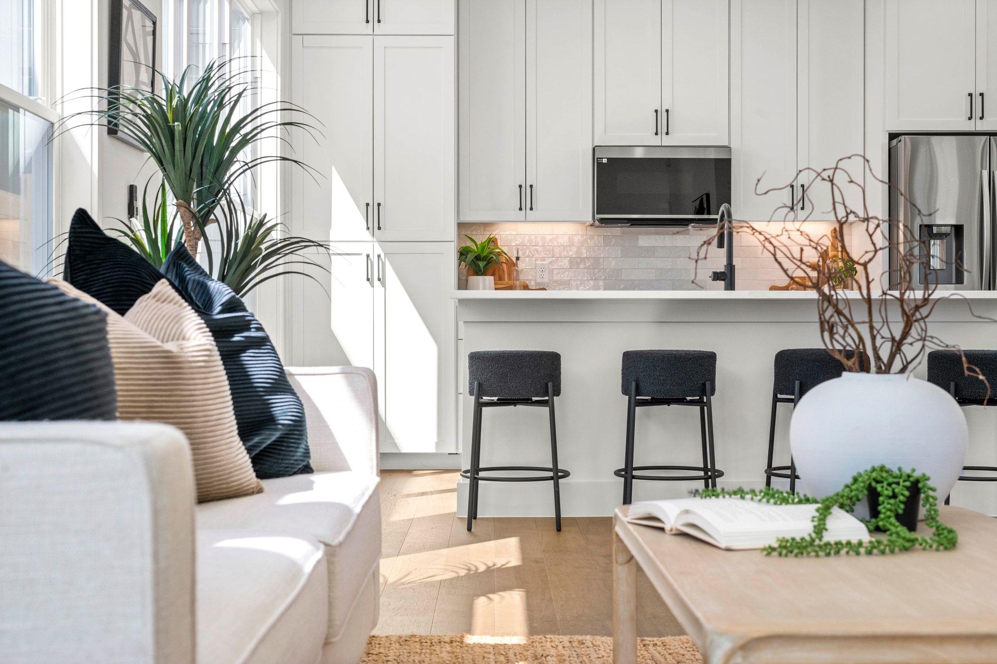 Kitchen with stainless steel appliances, a breakf