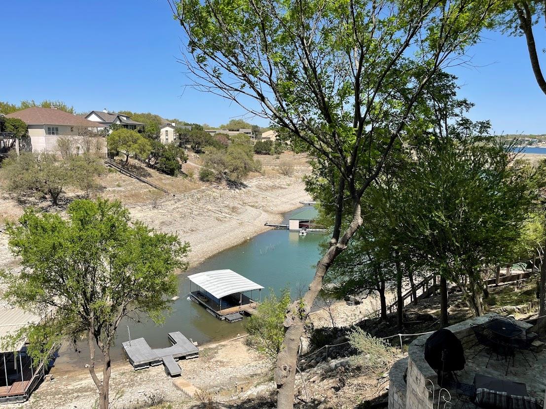 Water view featuring a floating dock