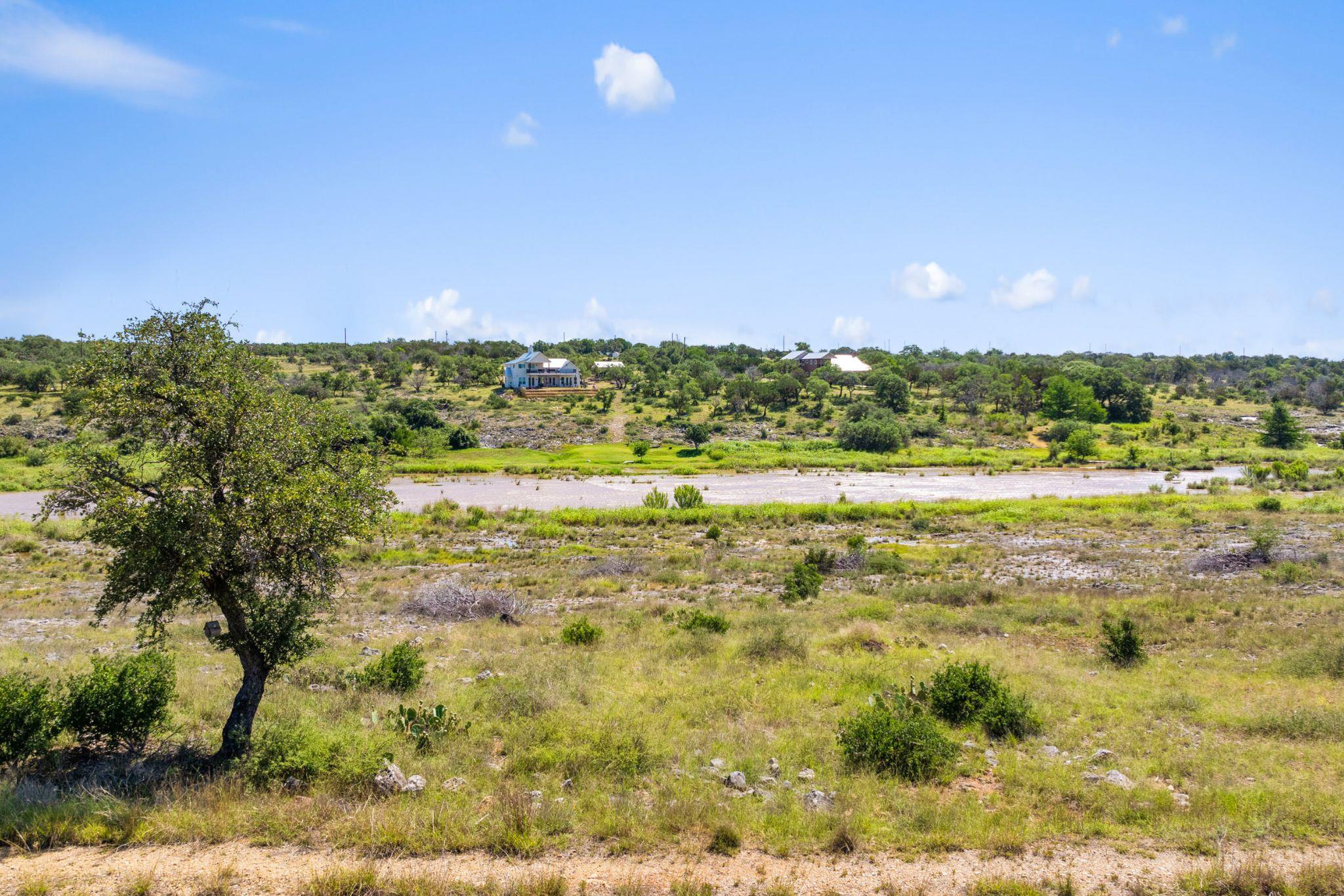 Water view with rural landscape