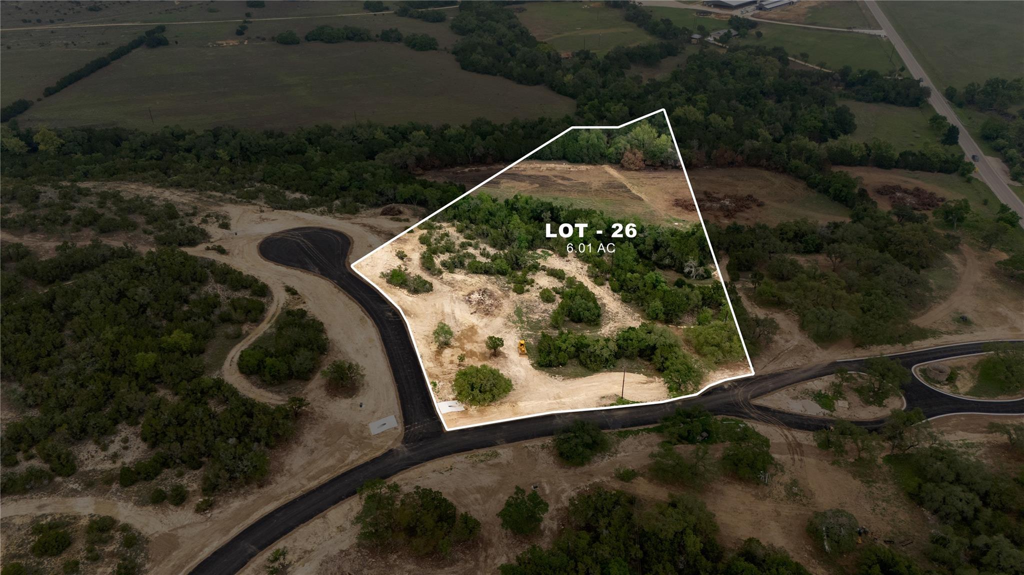 Expansive 6.01-acre lot featuring natural vegetat