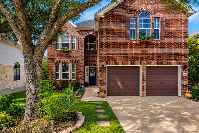 A classic brick exterior offers timeless curb app