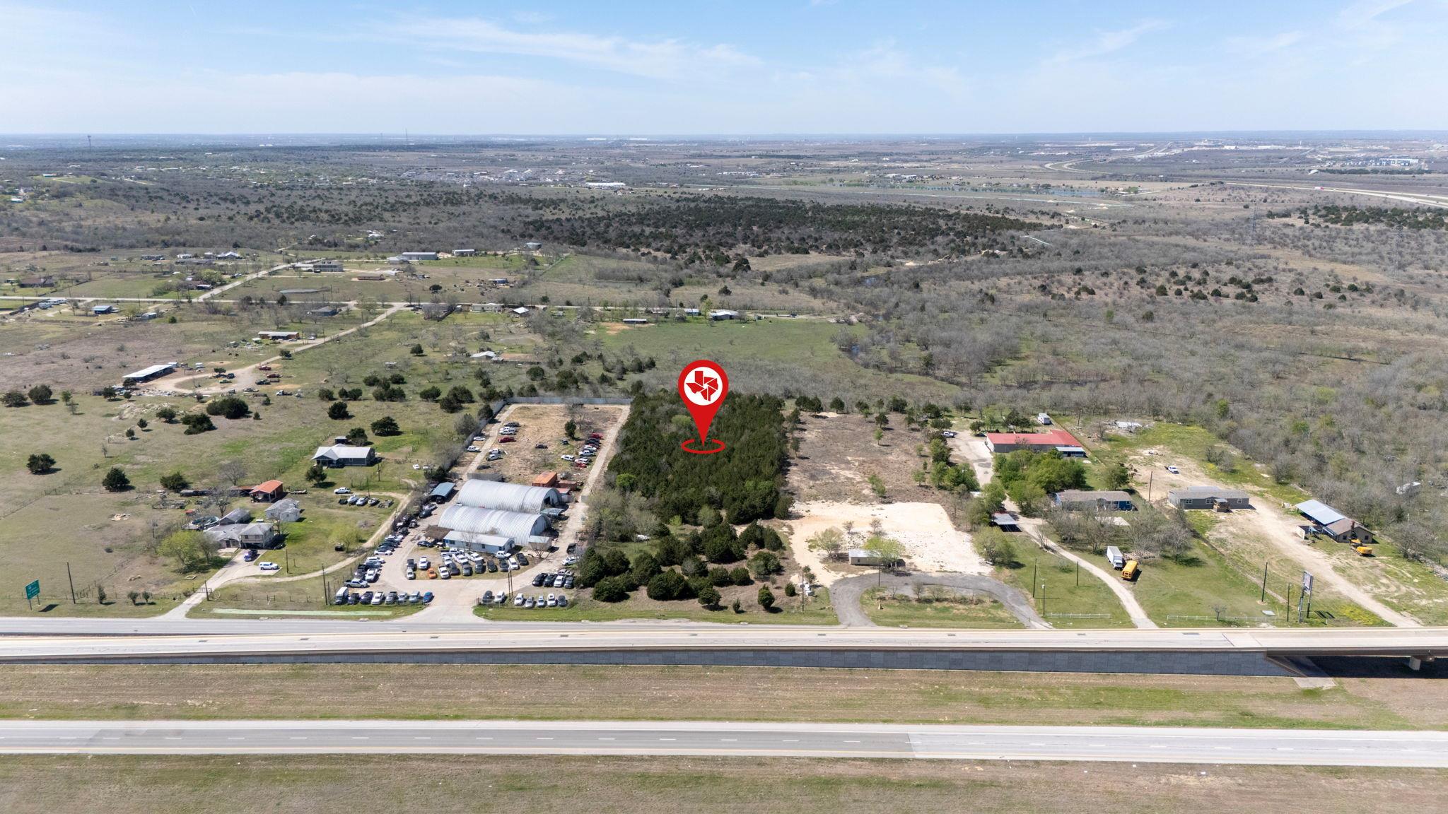 Aerial view of property's location with rural lan