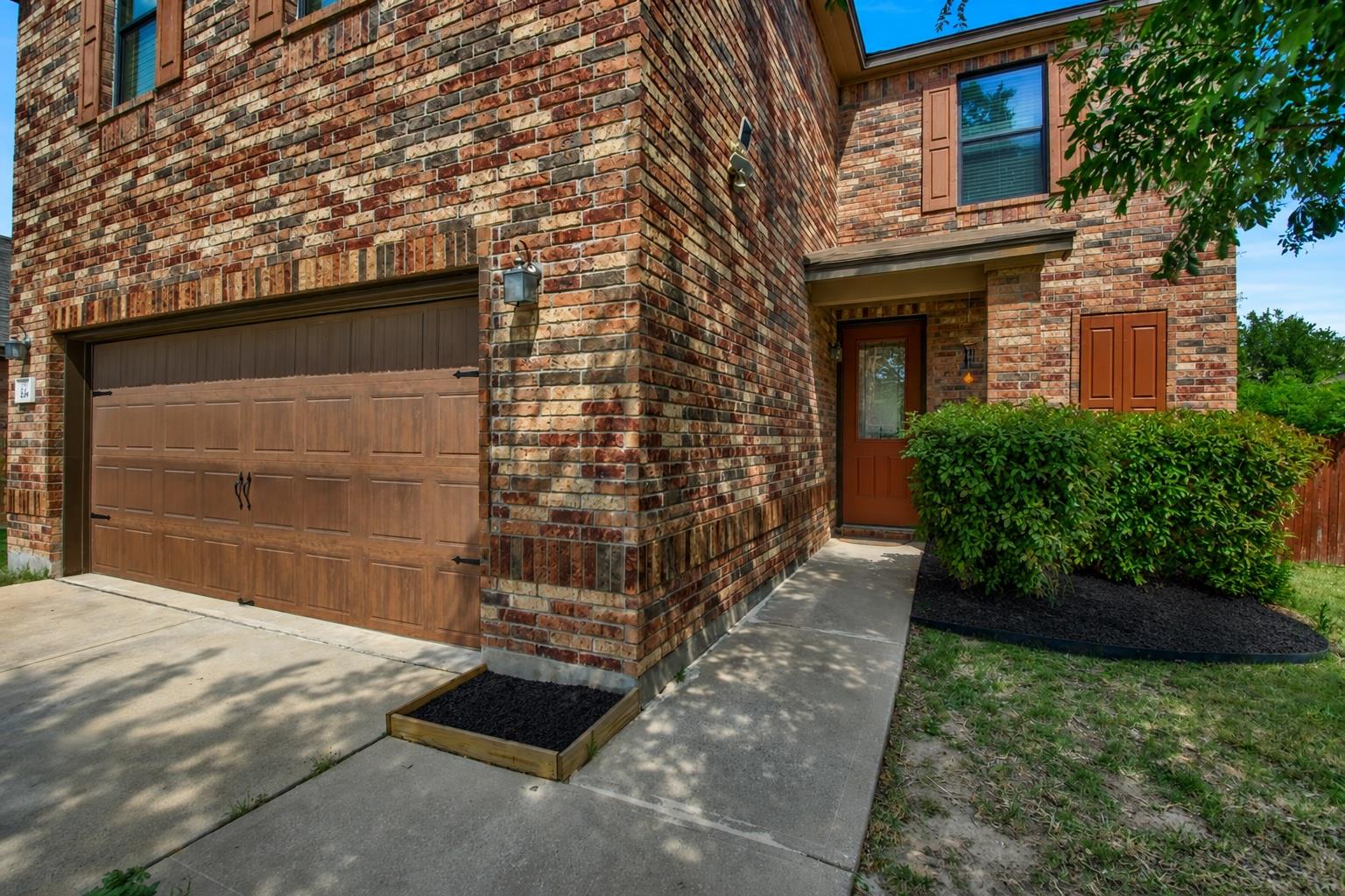 A well-maintained brick exterior with an integrat