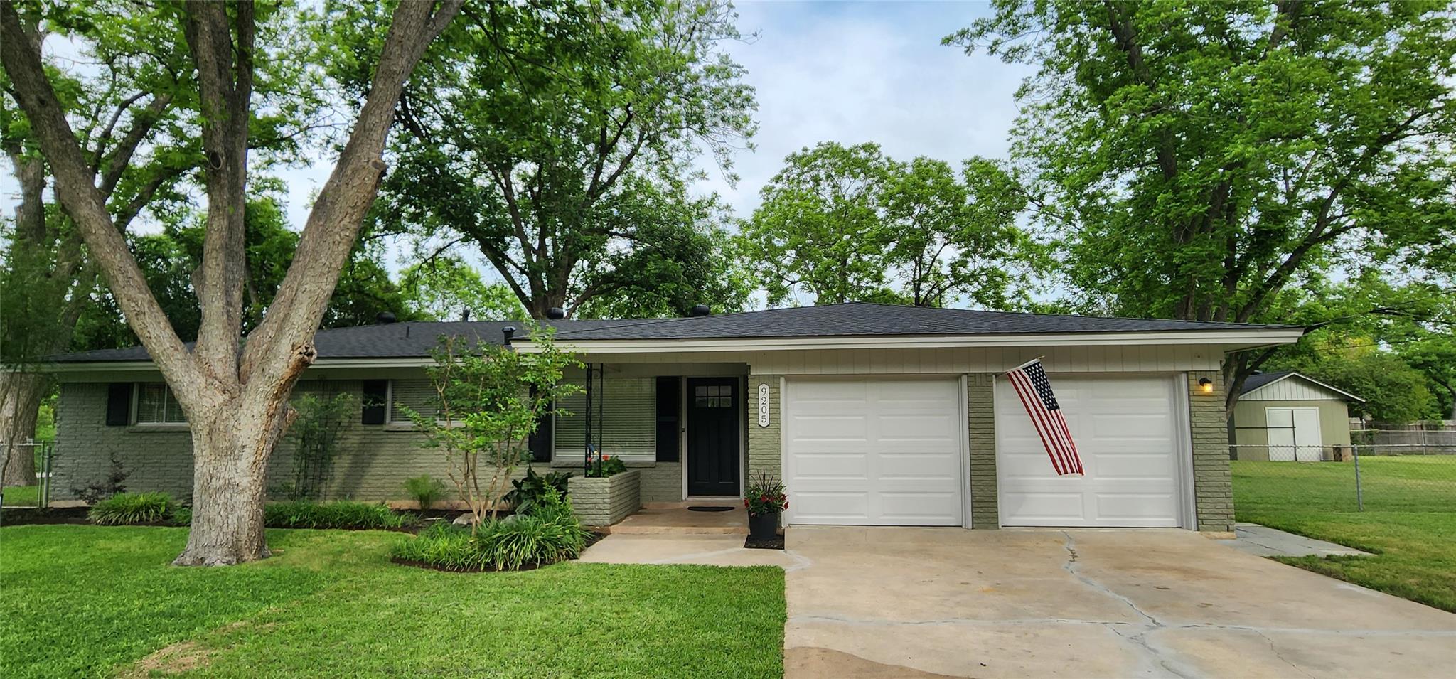 Ranch-style residence featuring a two-car garage,