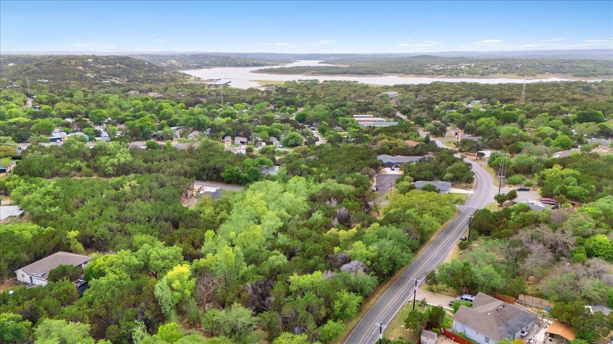 Bird's eye view of a nearby body of water and a f