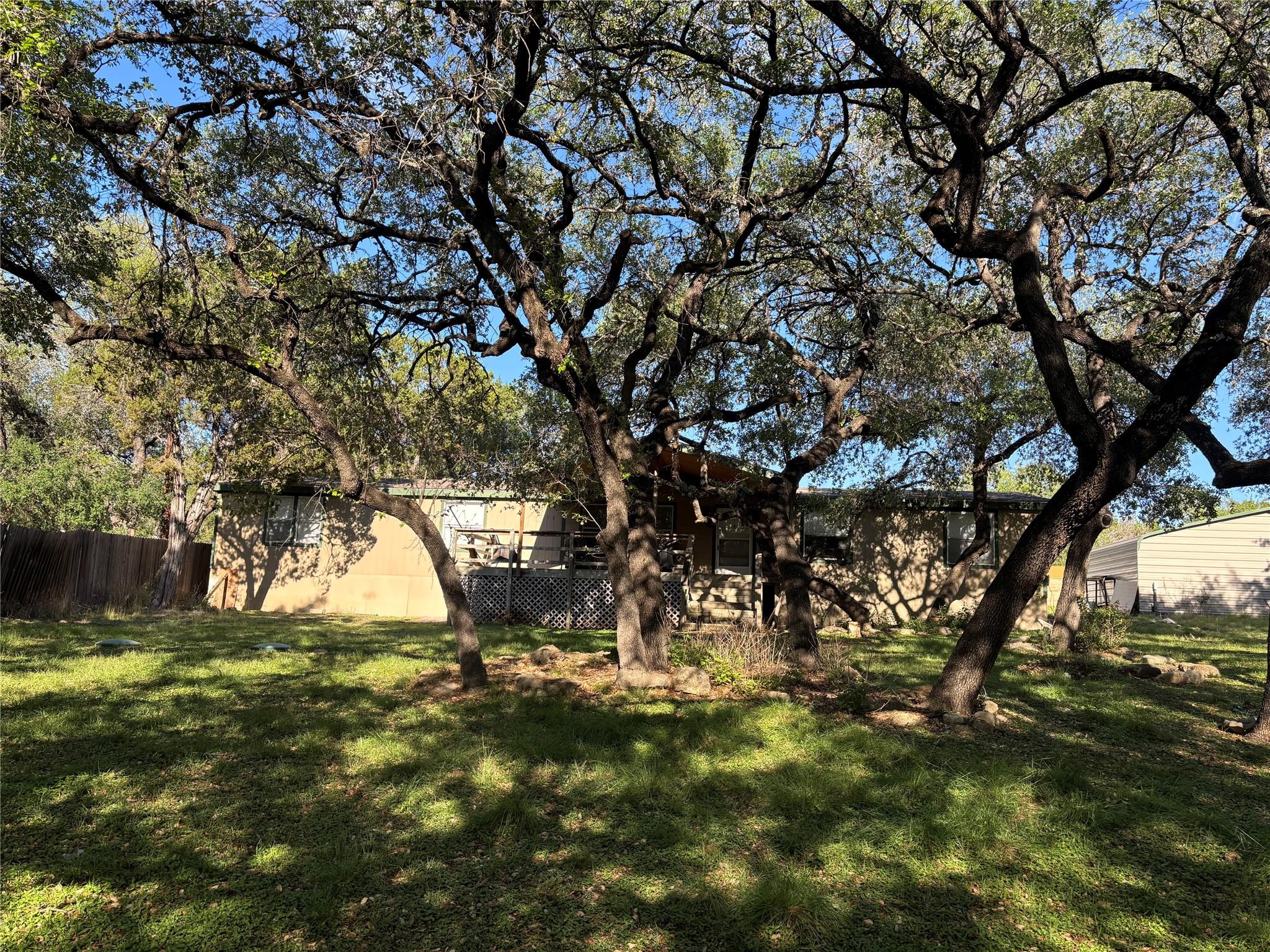 View of yard featuring a deck