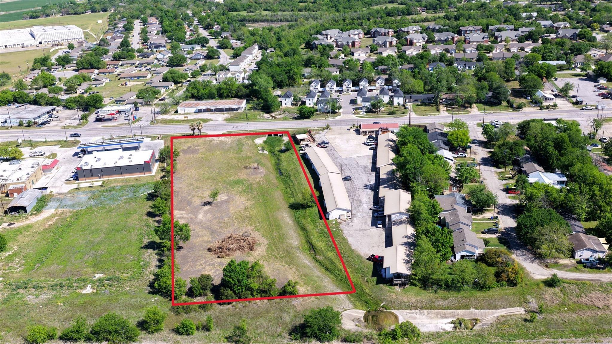 Aerial view of a substantial undeveloped lot, out