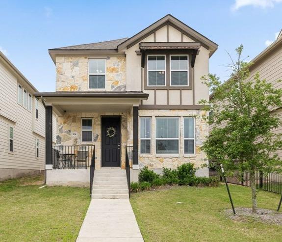 A charming facade combines stone and stucco, feat