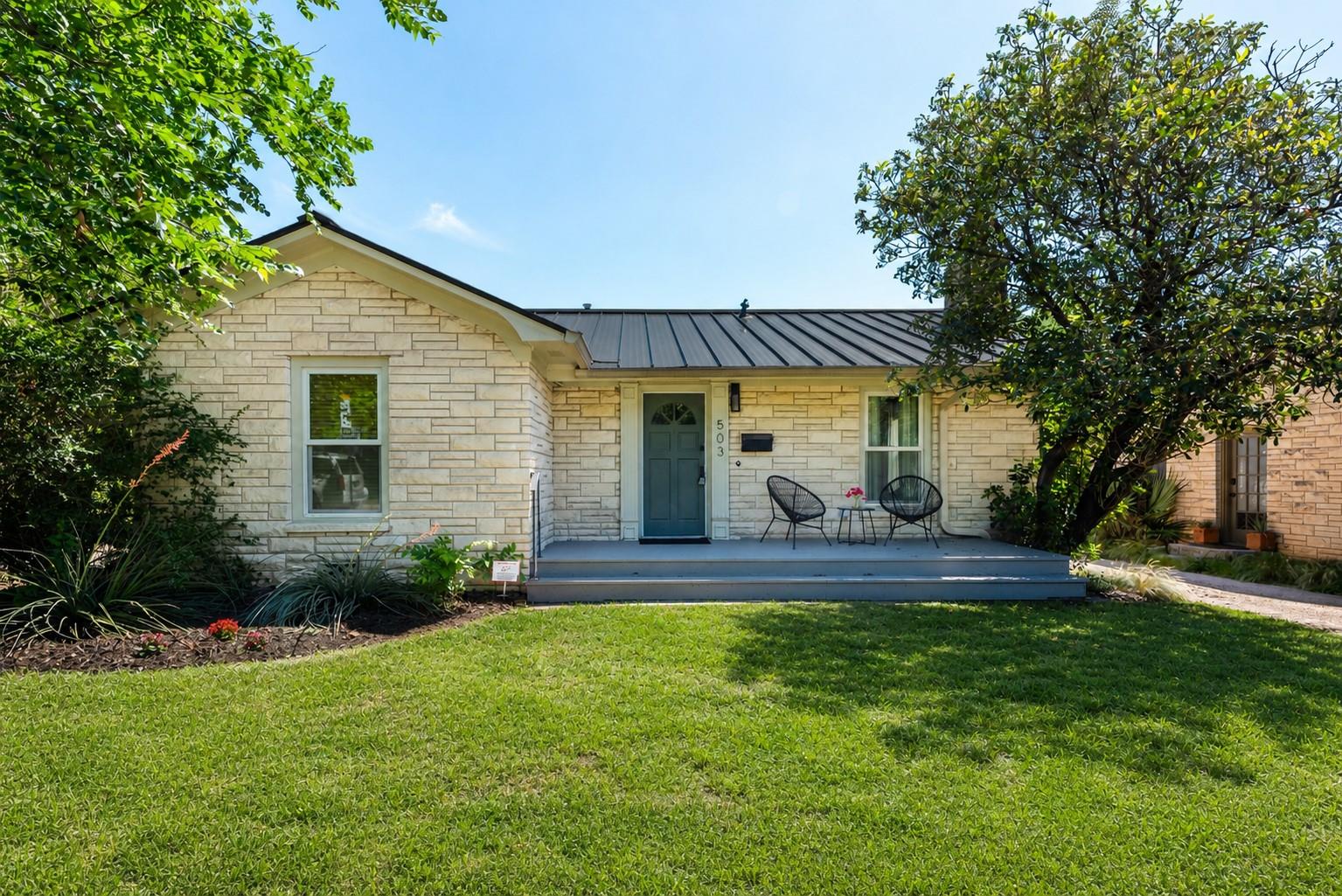 Exterior featuring a light-colored stacked stone 
