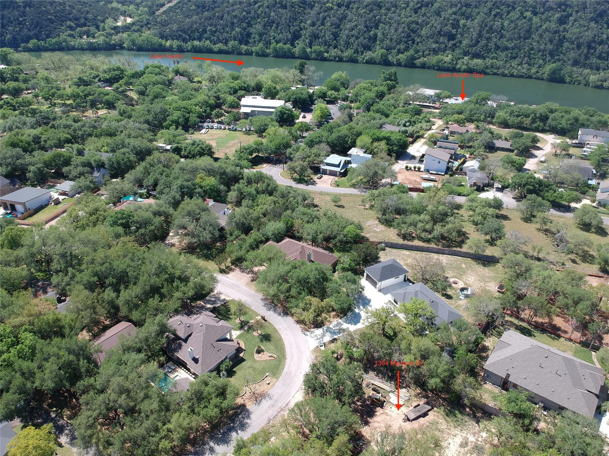 Aerial view showcasing the property's setting ami