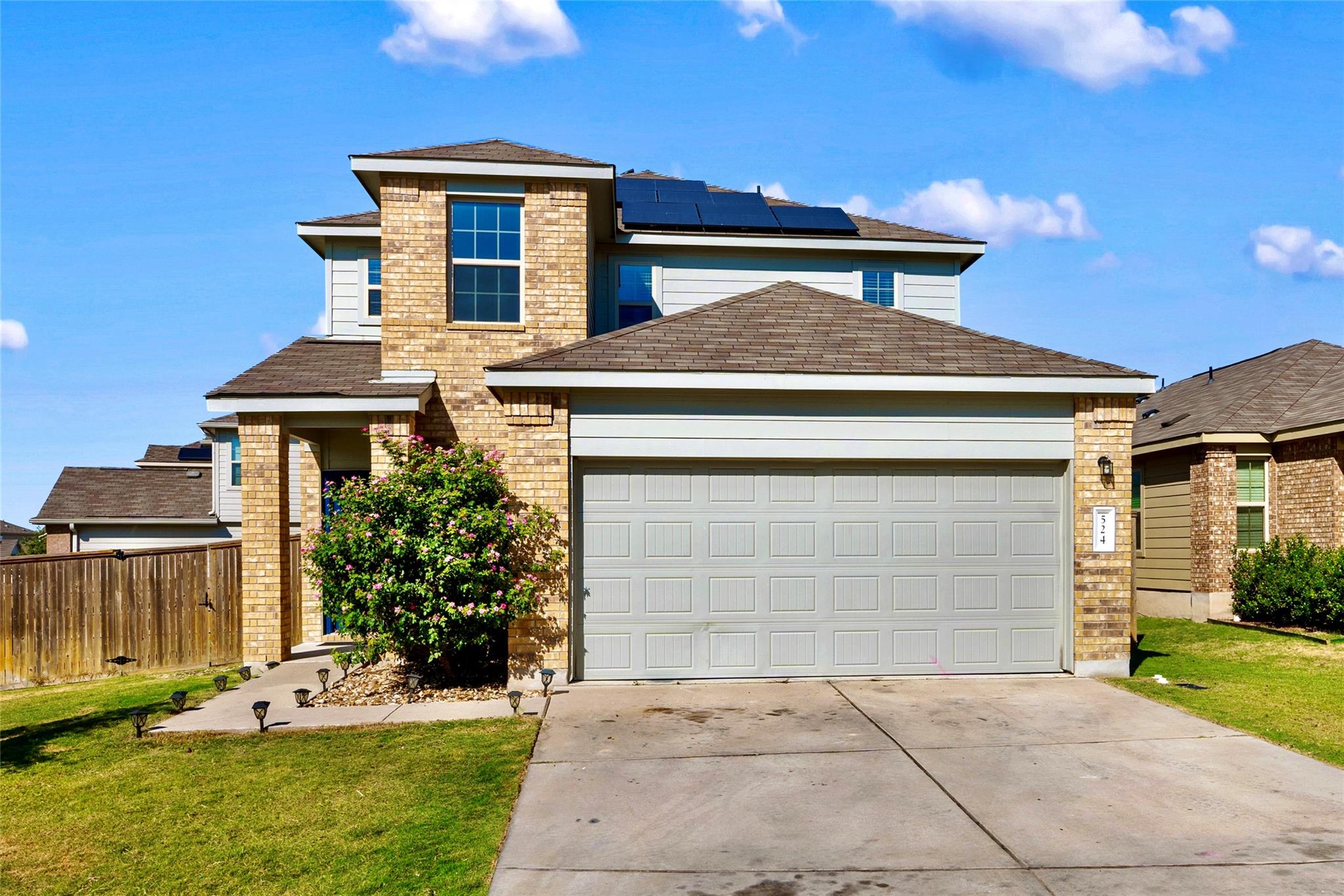 Traditional-style home with roof mounted solar pa