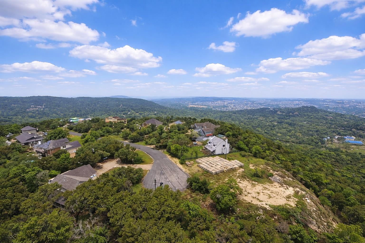 This aerial view showcases a property with a pave