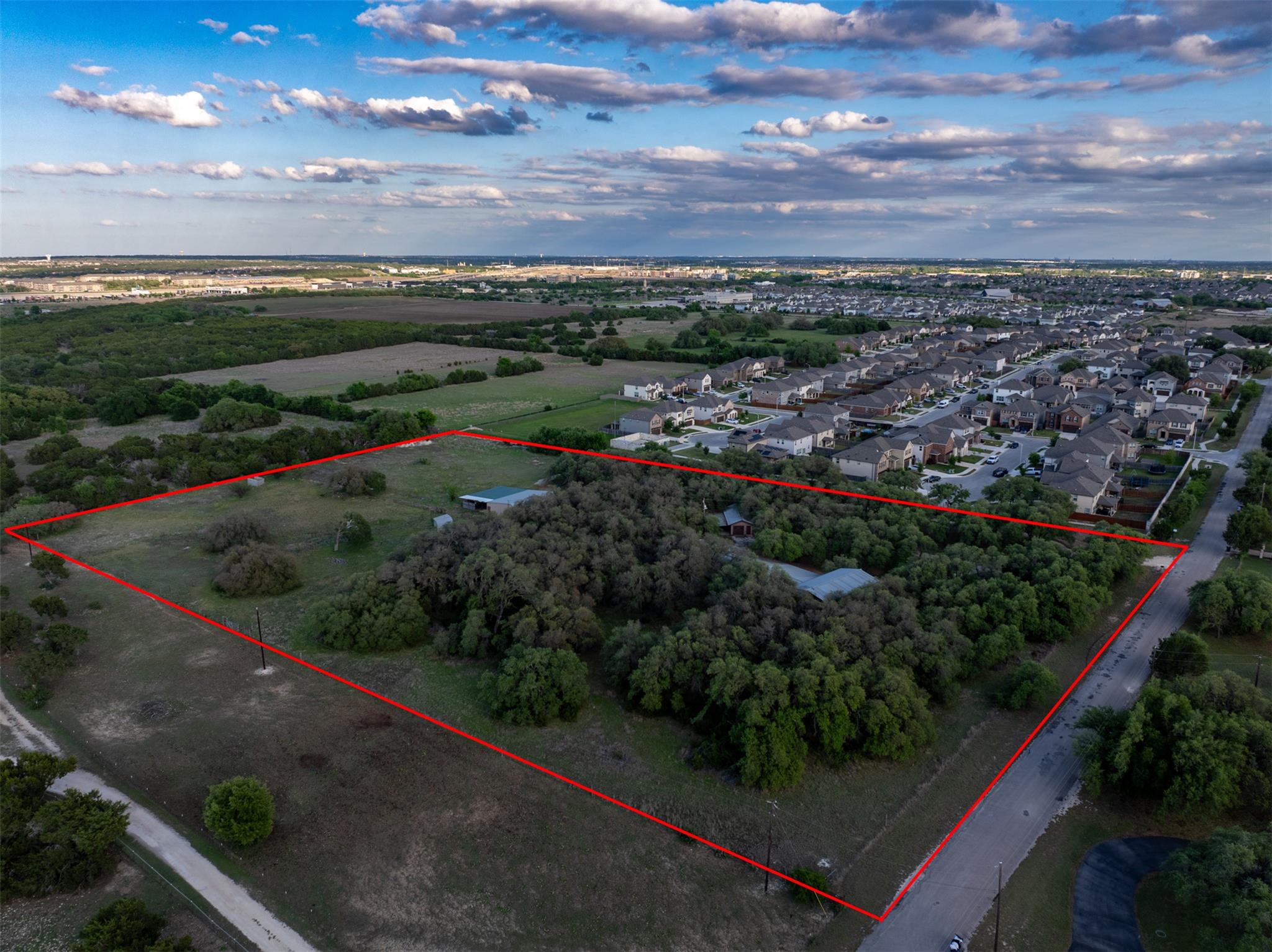 Expansive property featuring a mix of open land a