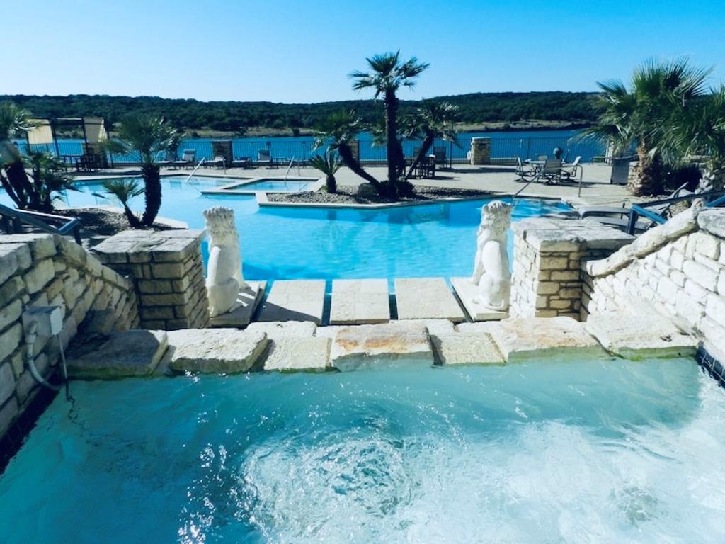 Community pool with a patio area