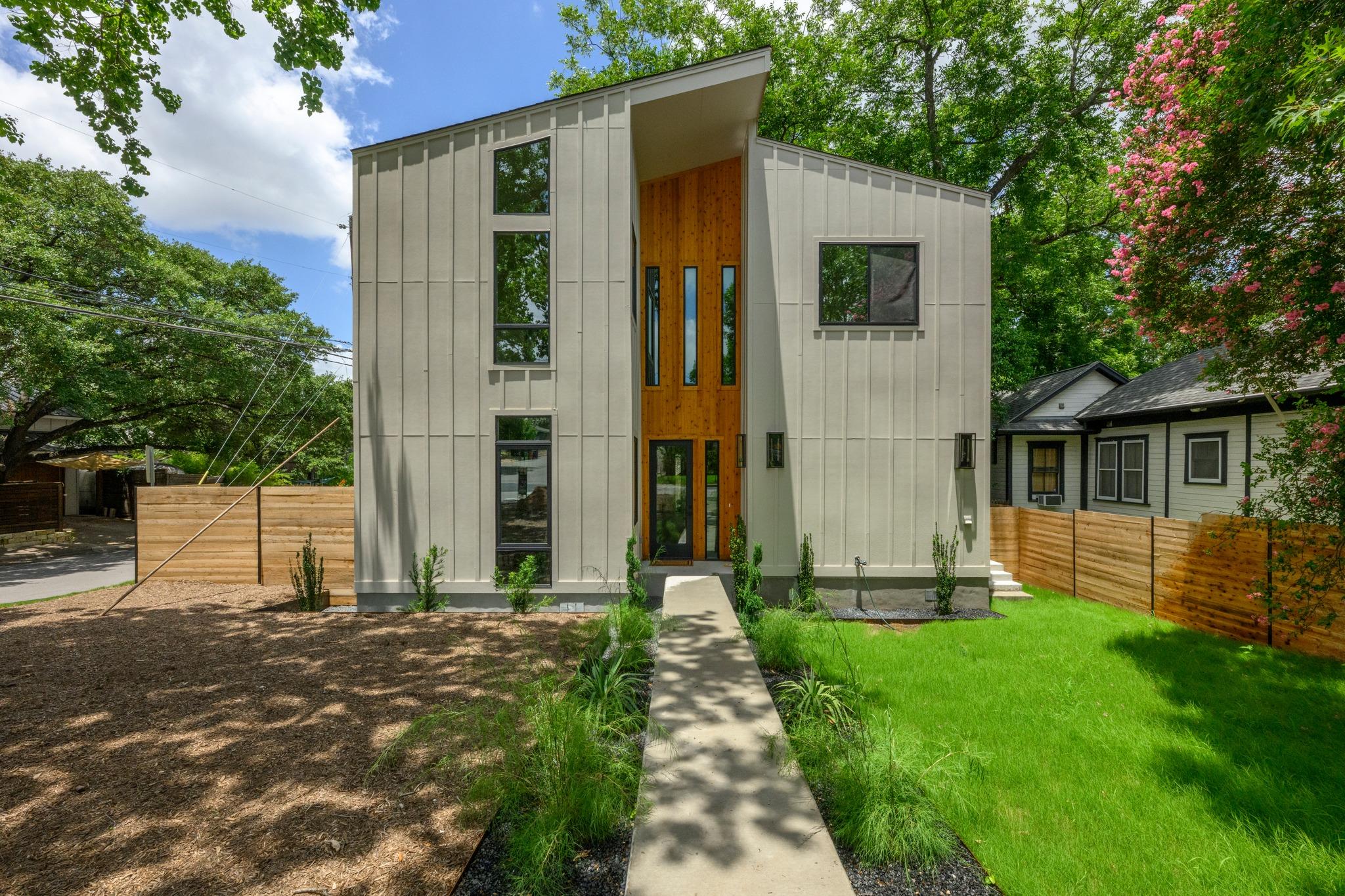 A striking modern facade with clean lines and a s