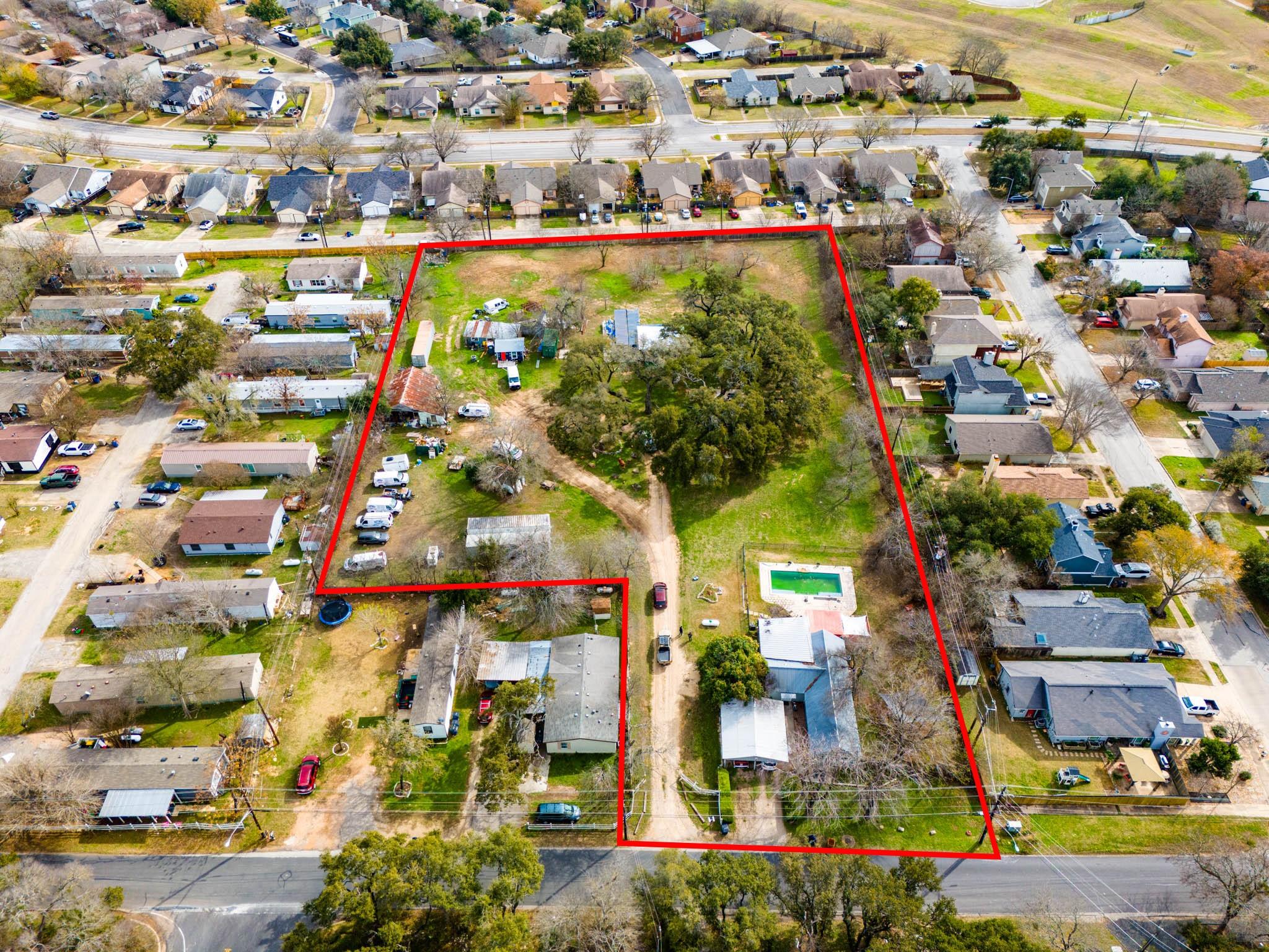 Aerial perspective of suburban area with property