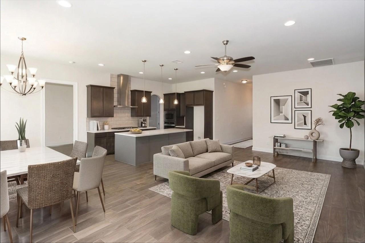 An open floorplan seamlessly connects the dining 