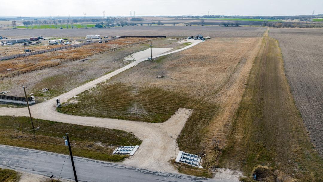 Aerial view of sparsely populated area featuring 