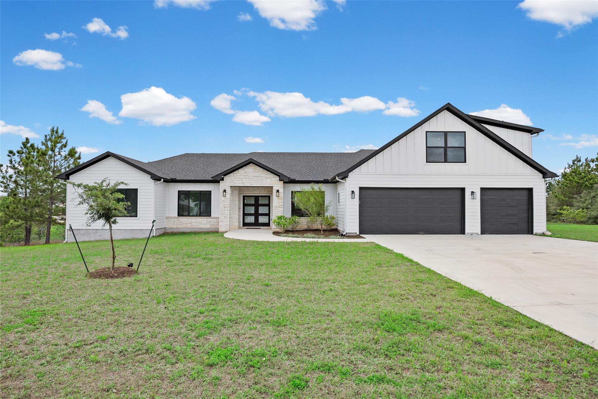 Modern farmhouse design with a crisp white facade